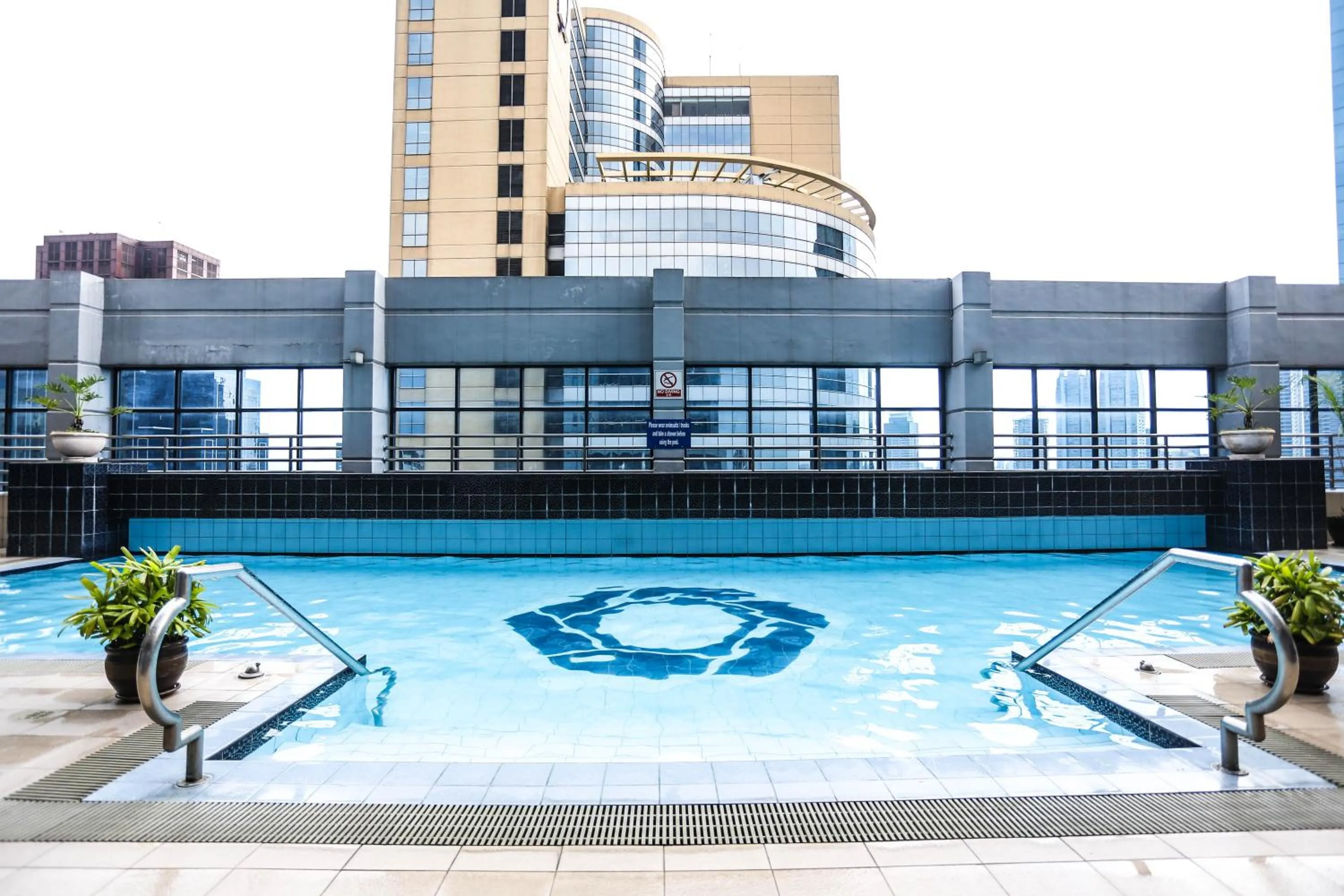 Swimming pool in The Malayan Plaza Hotel
