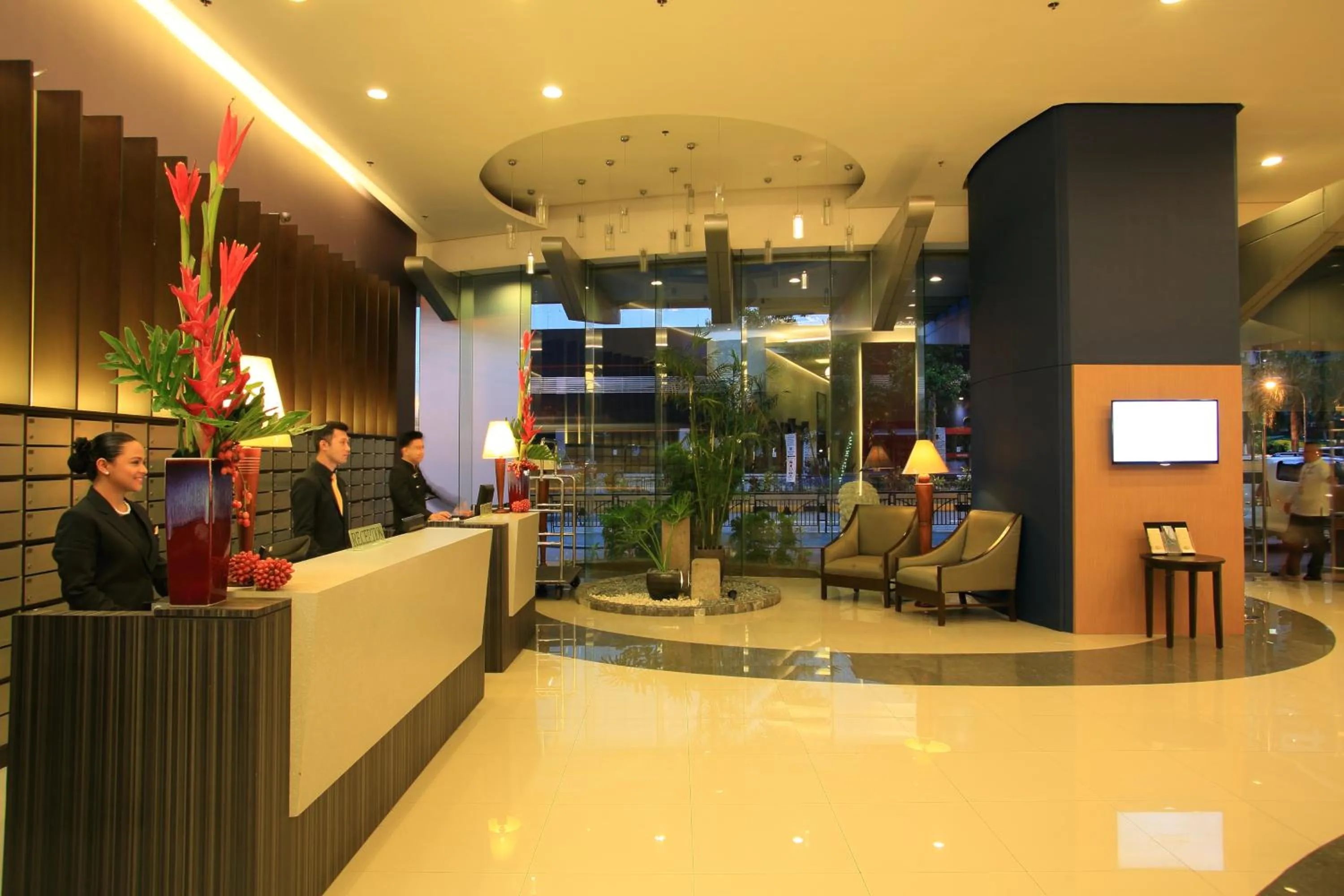 Lobby or reception in The Malayan Plaza Hotel