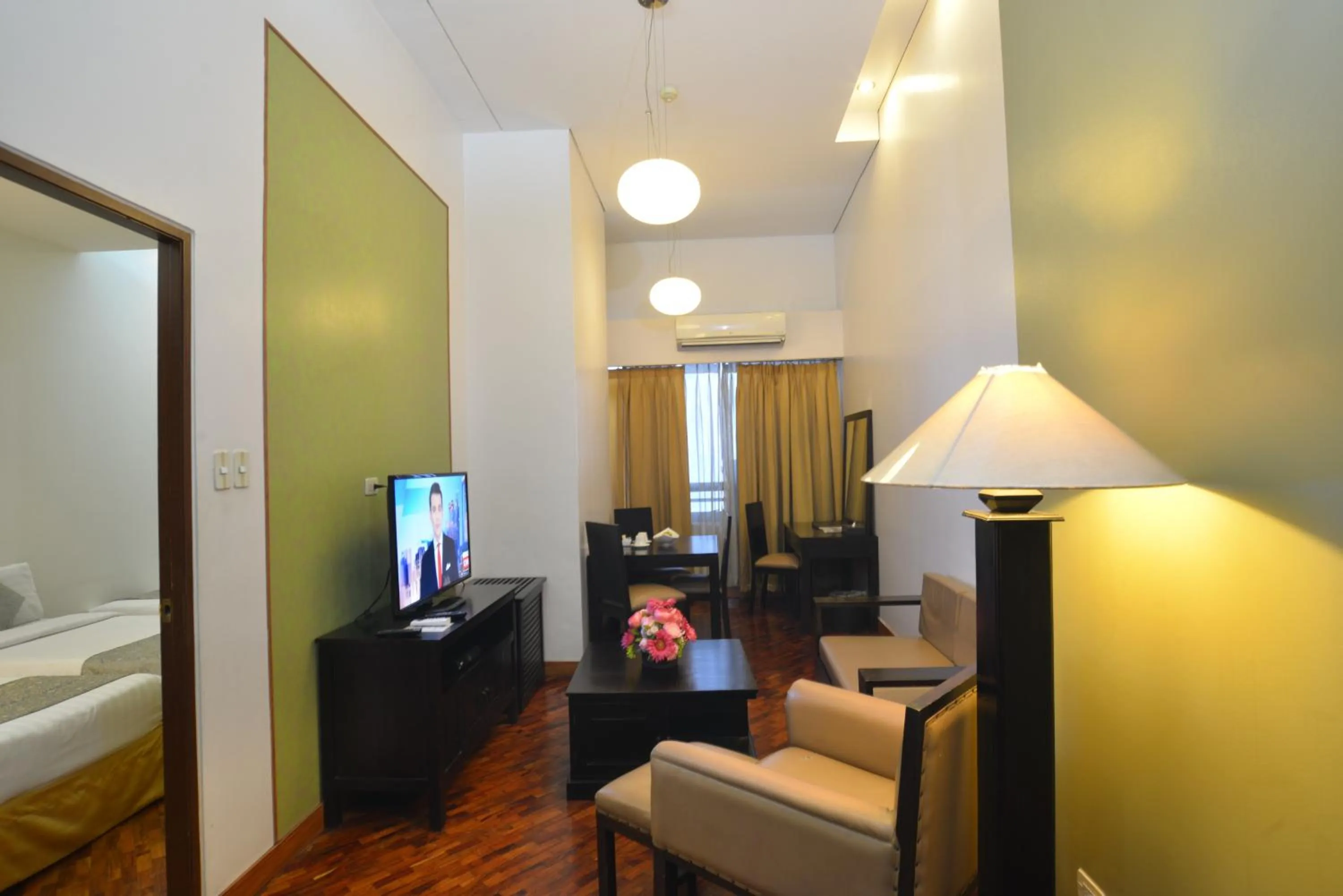 Photo of the whole room, Bed in The Malayan Plaza Hotel