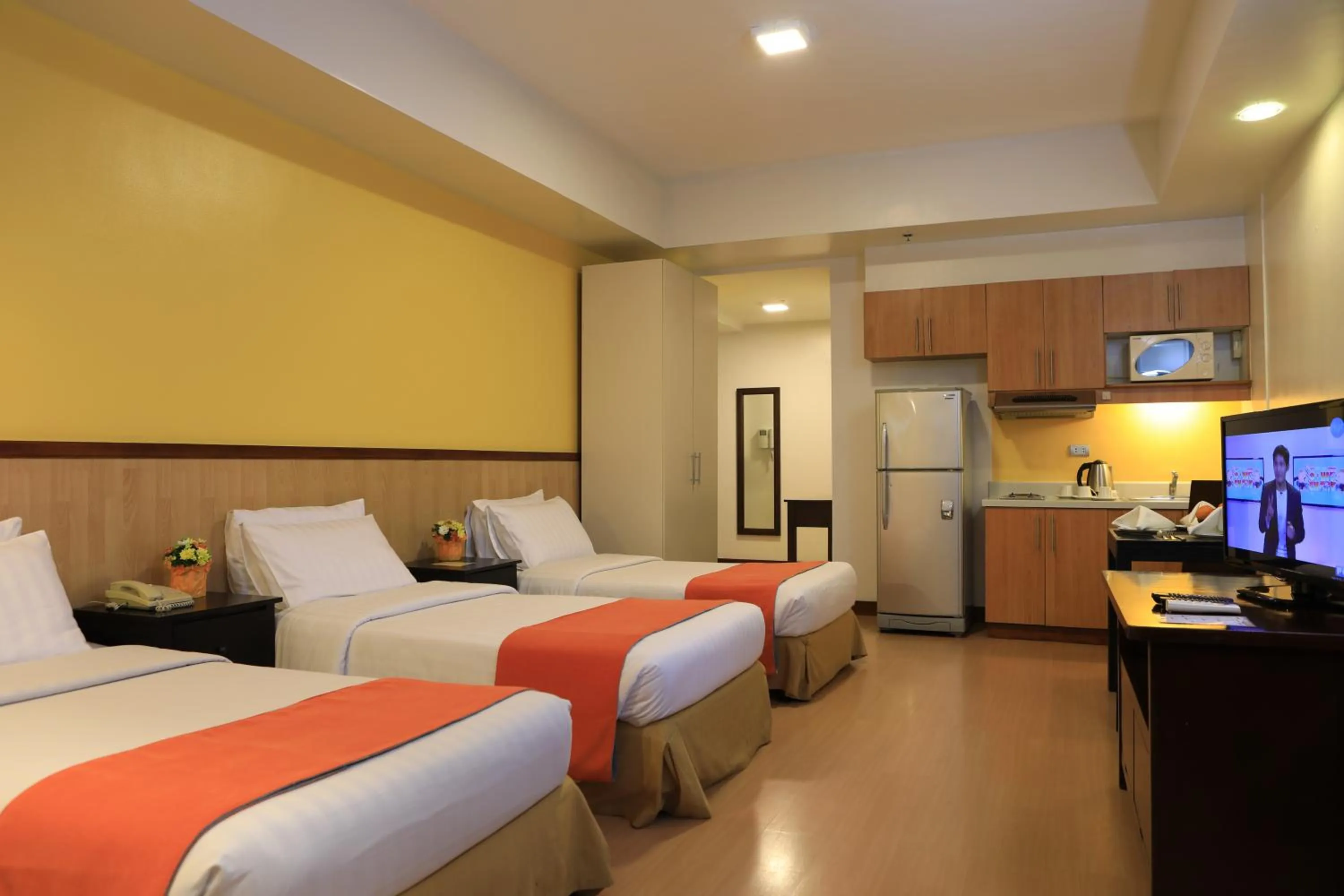 Photo of the whole room, Bed in The Malayan Plaza Hotel