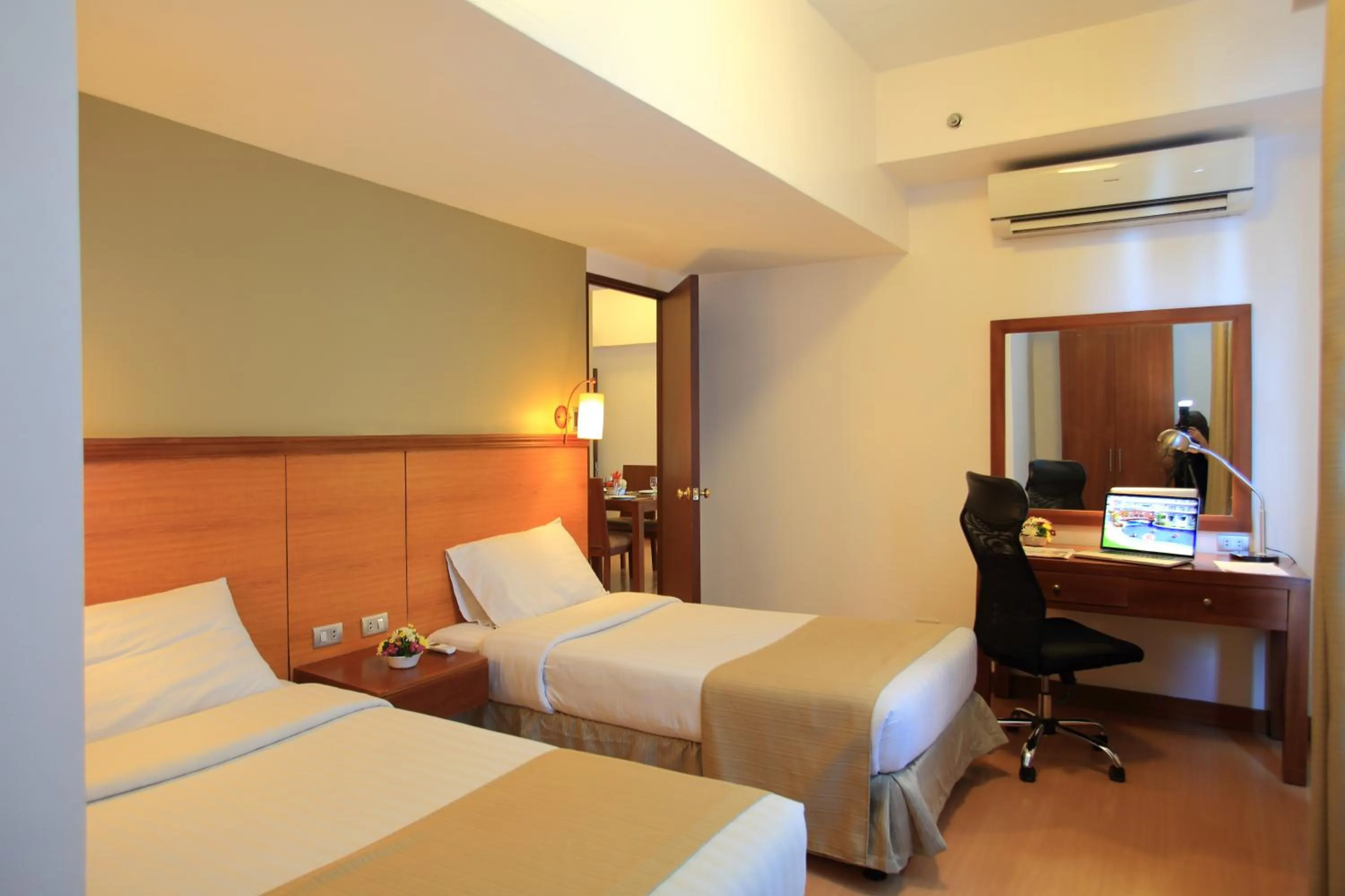 Bed in The Malayan Plaza Hotel