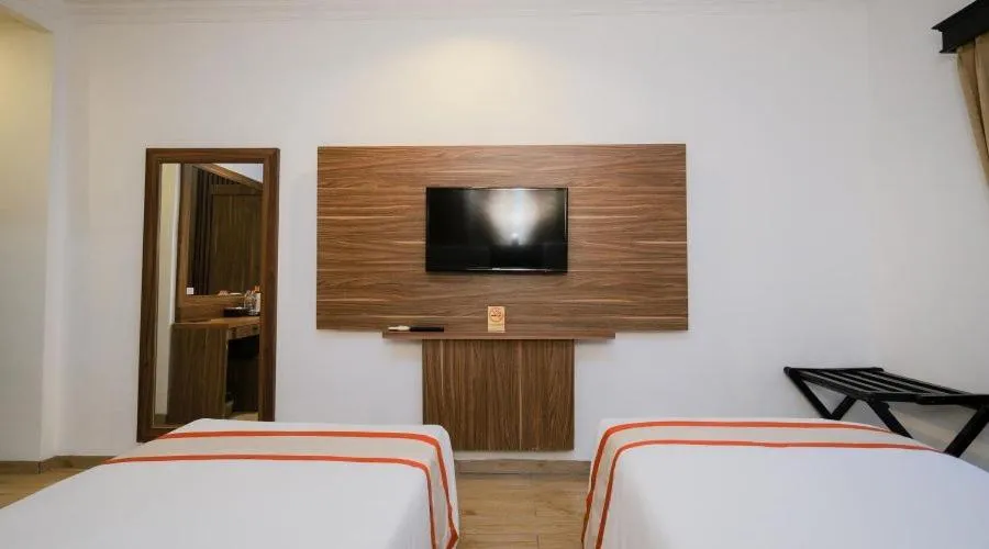 Bed in The Grand Palace Hotel Yogyakarta