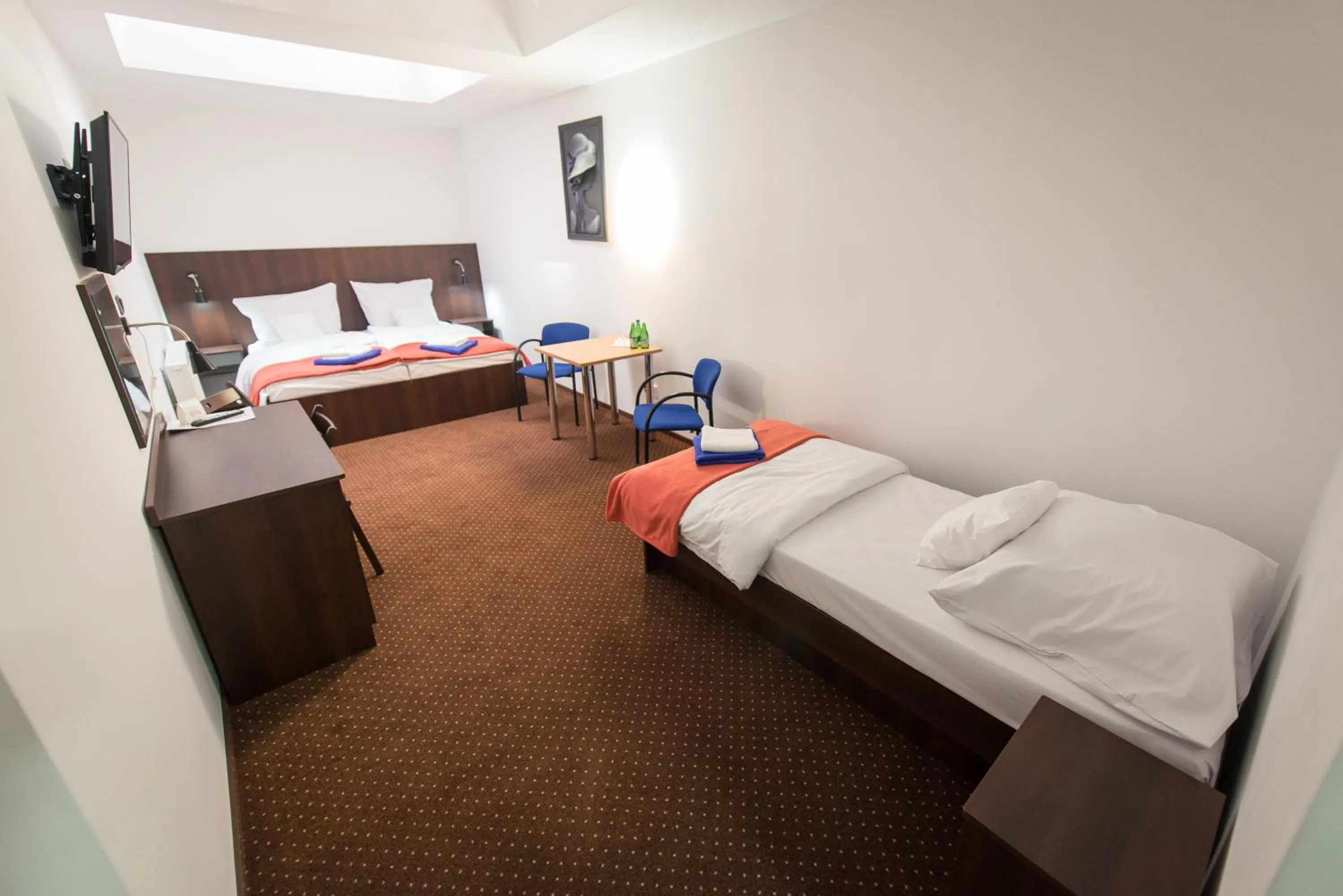 Photo of the whole room, Bed in First Hotel