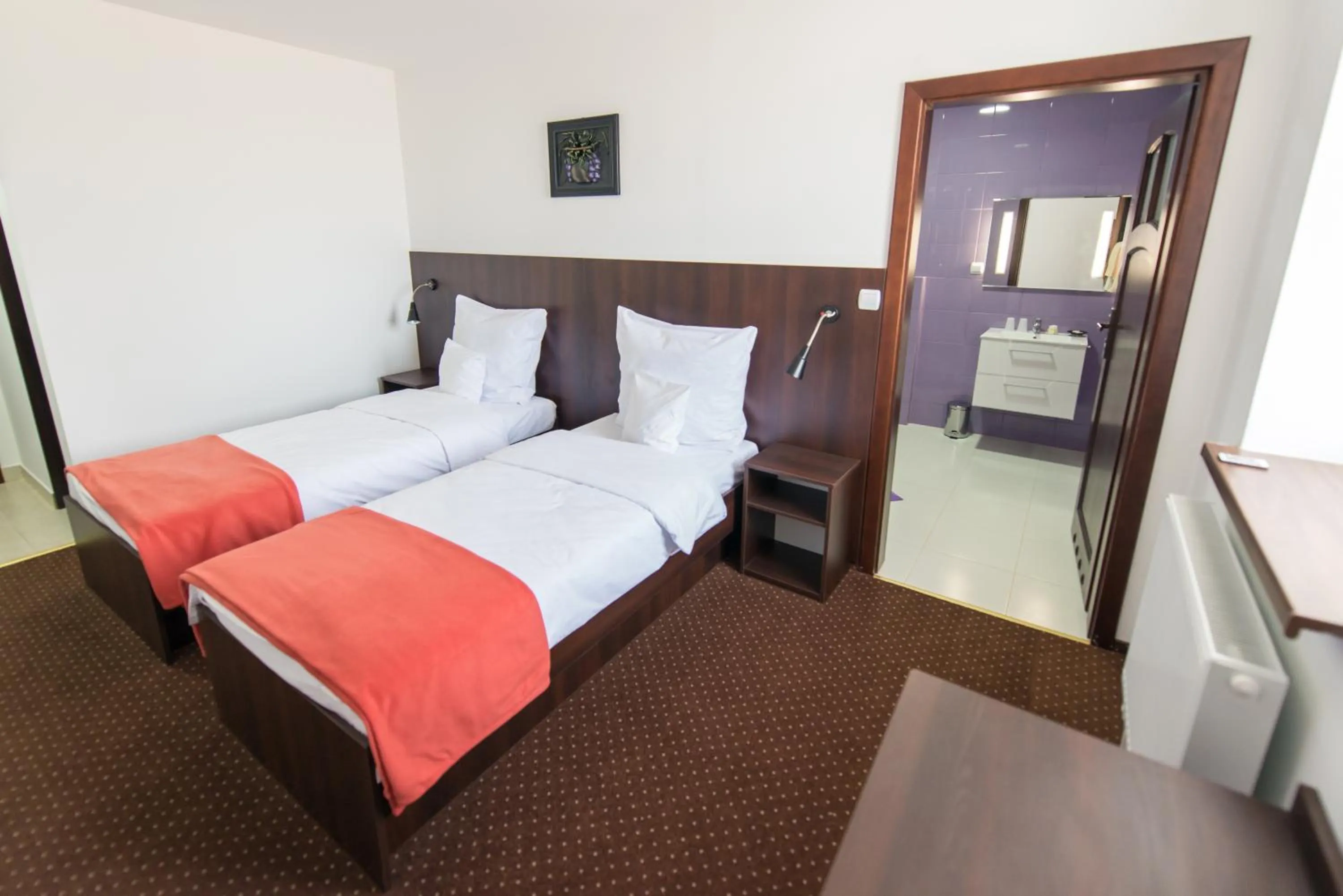 Photo of the whole room, Bed in First Hotel