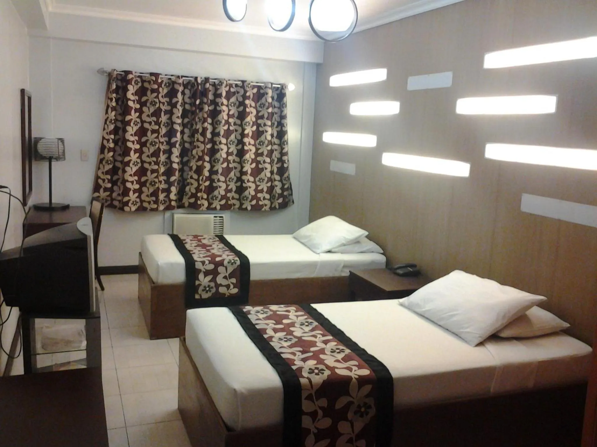 Bed in Jupiter Suites