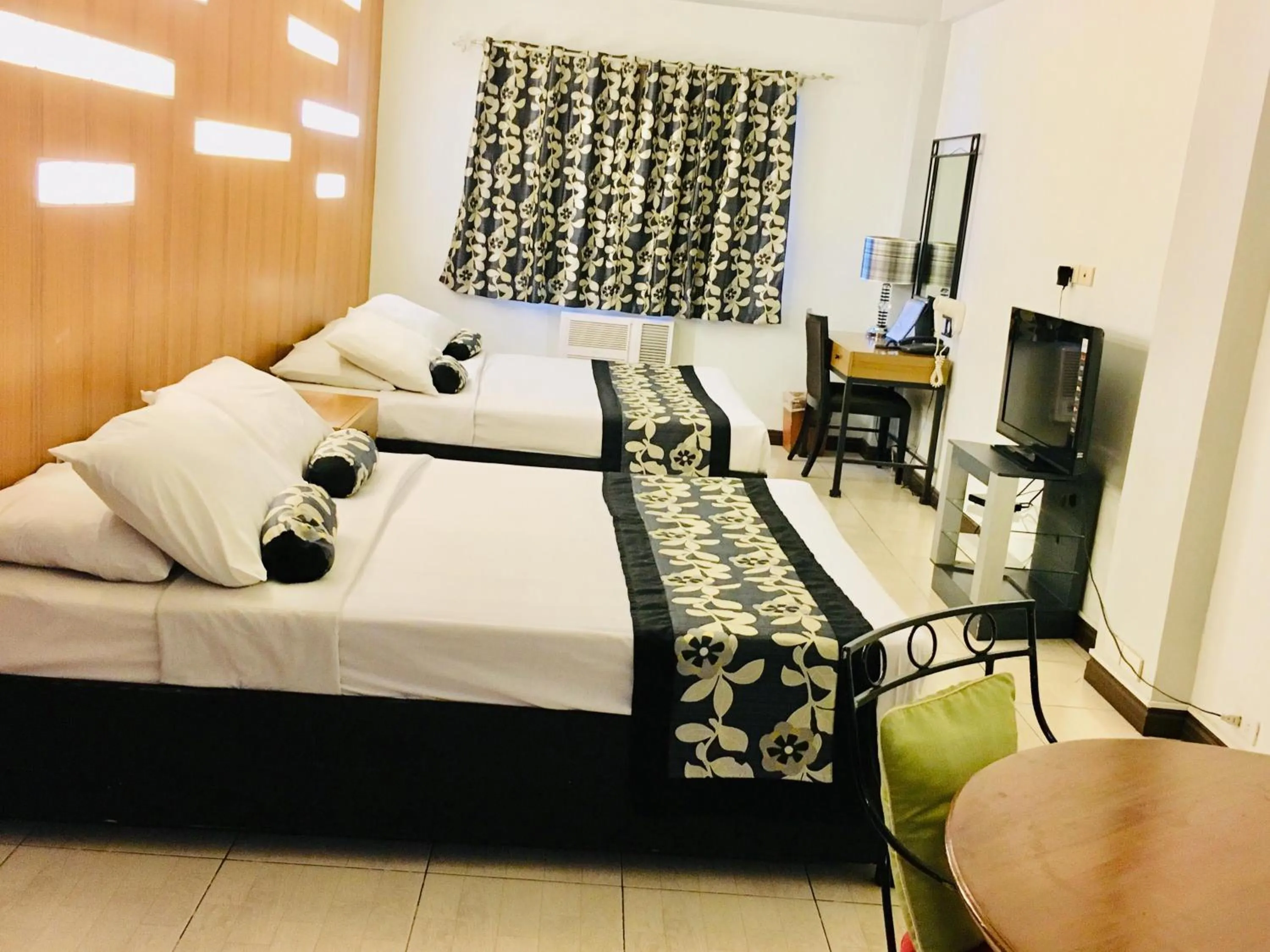 Bed in Jupiter Suites