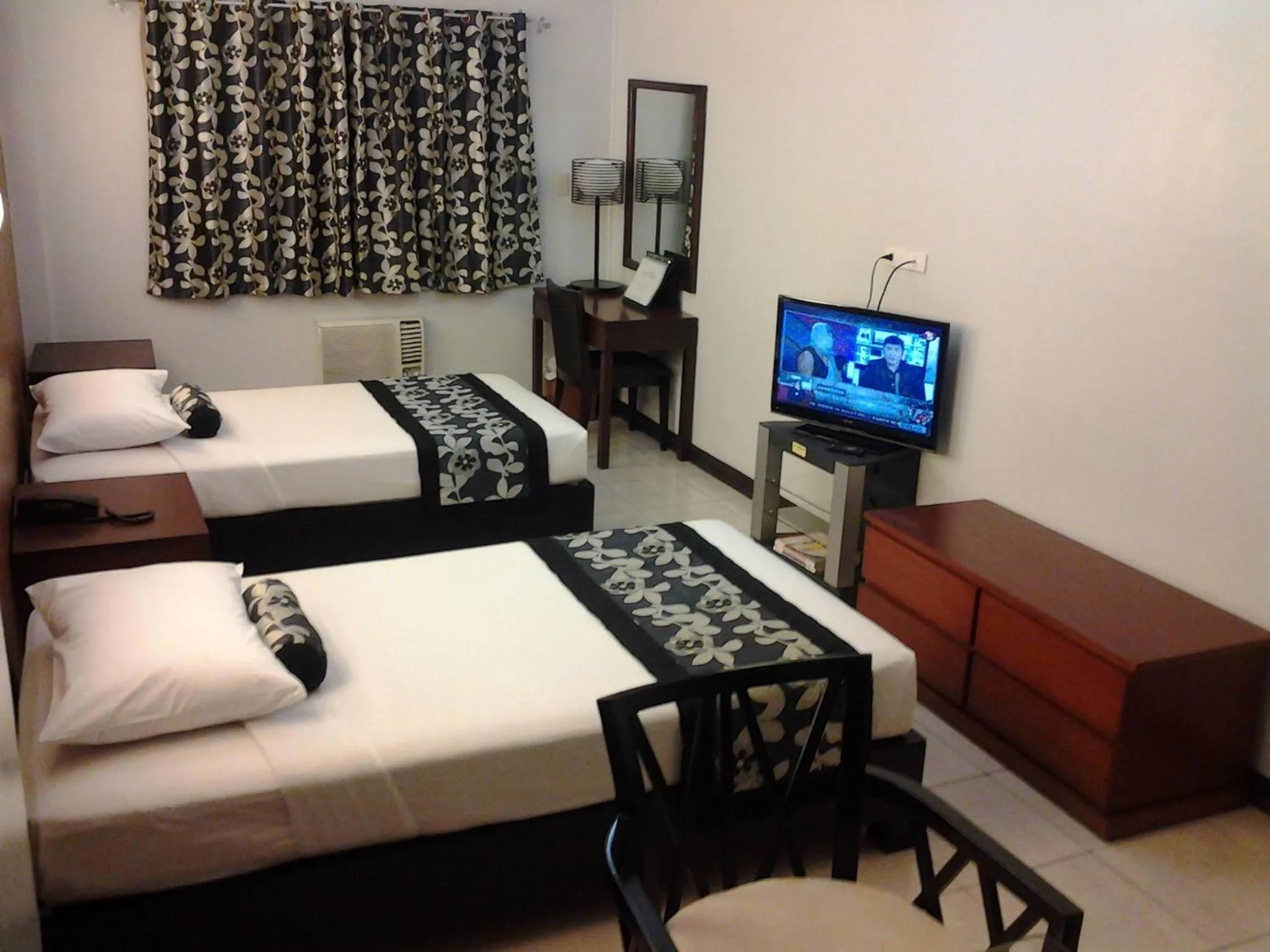 Bed in Jupiter Suites