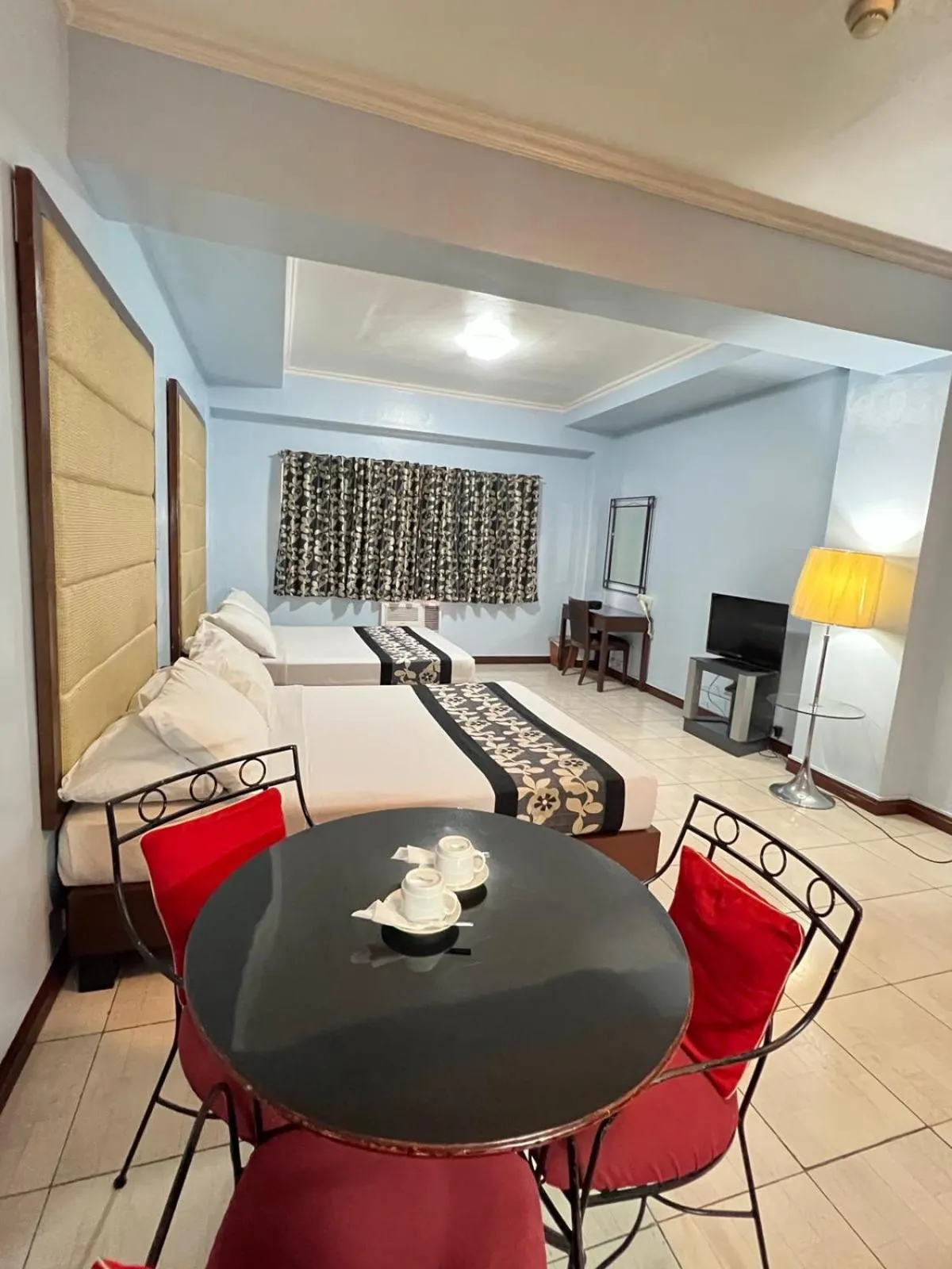 Bed in Jupiter Suites