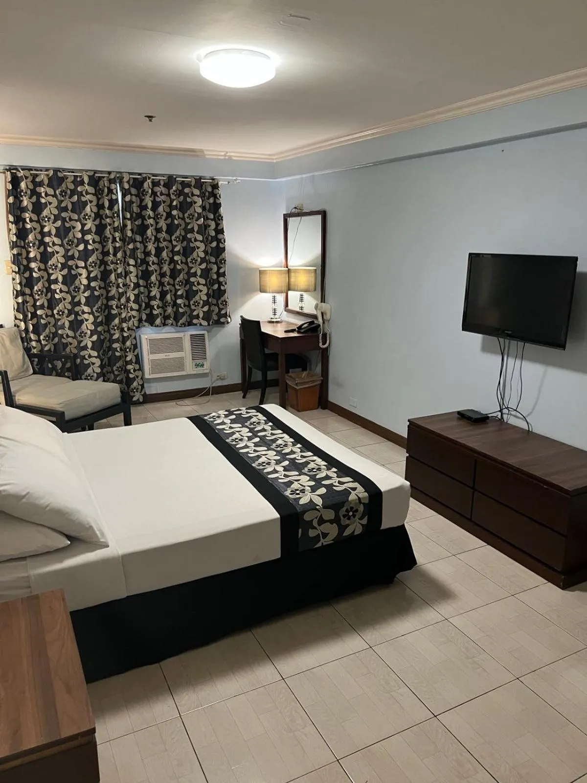 Bed in Jupiter Suites