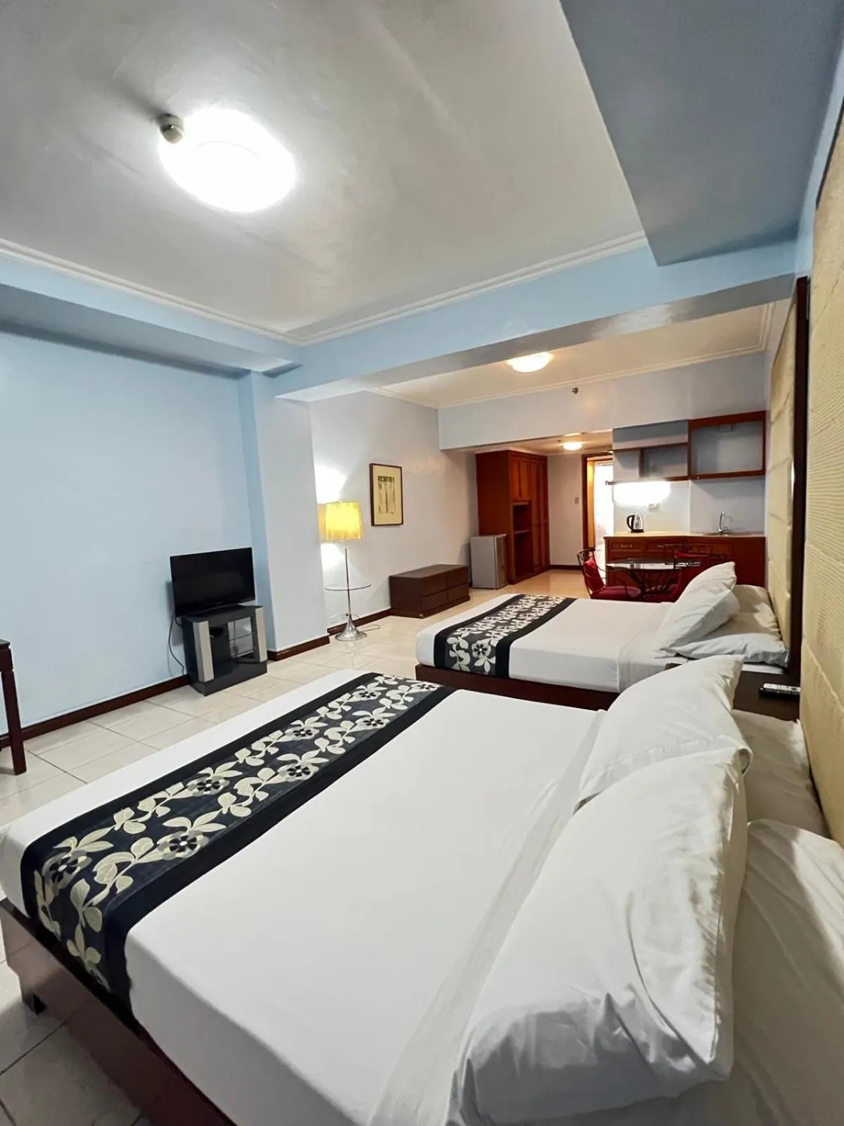 Bed in Jupiter Suites