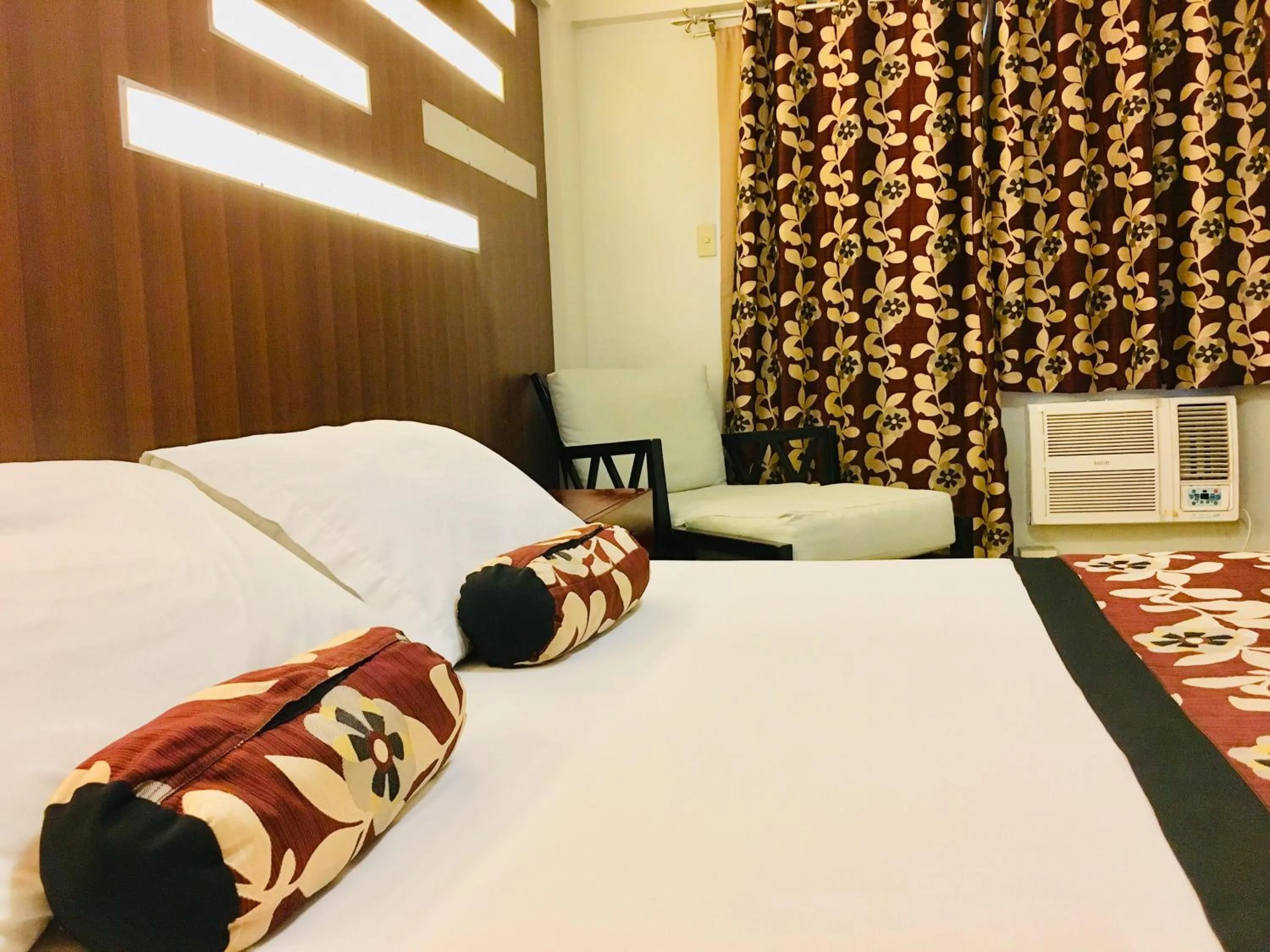 Bed in Jupiter Suites