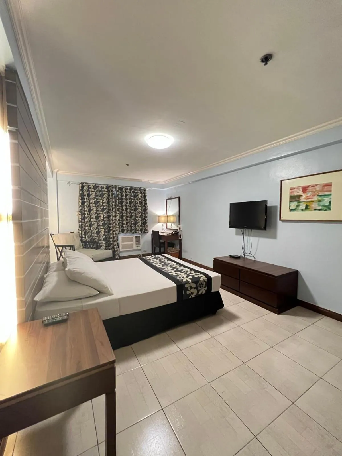 Bed in Jupiter Suites