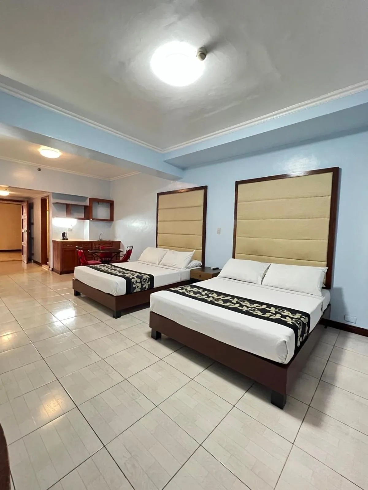 Bed in Jupiter Suites