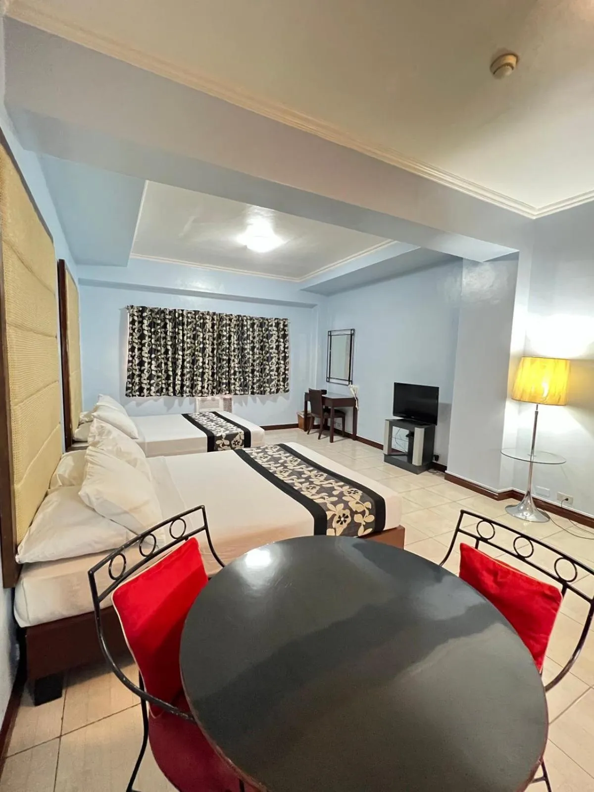 Bed in Jupiter Suites