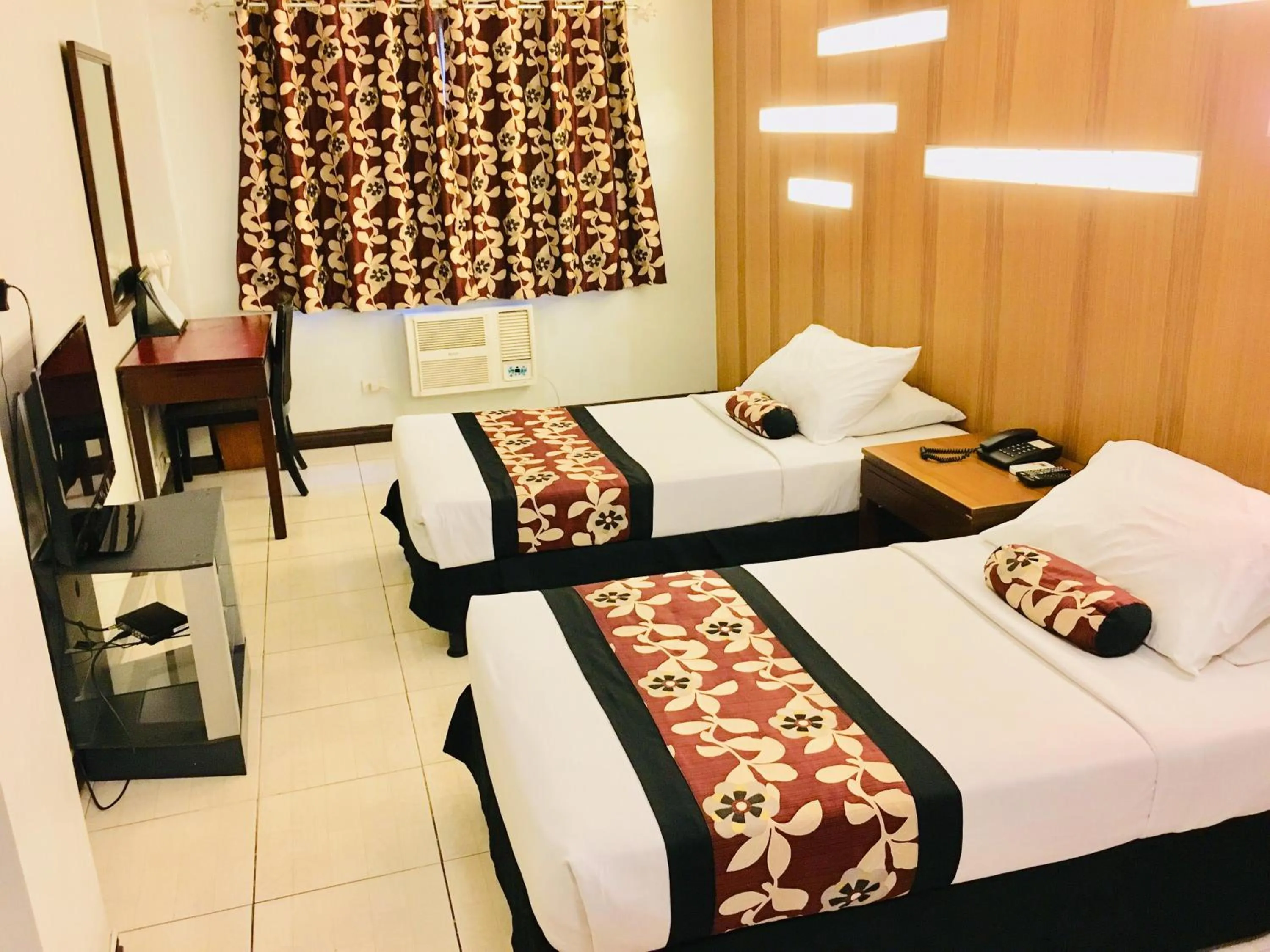 Bed in Jupiter Suites