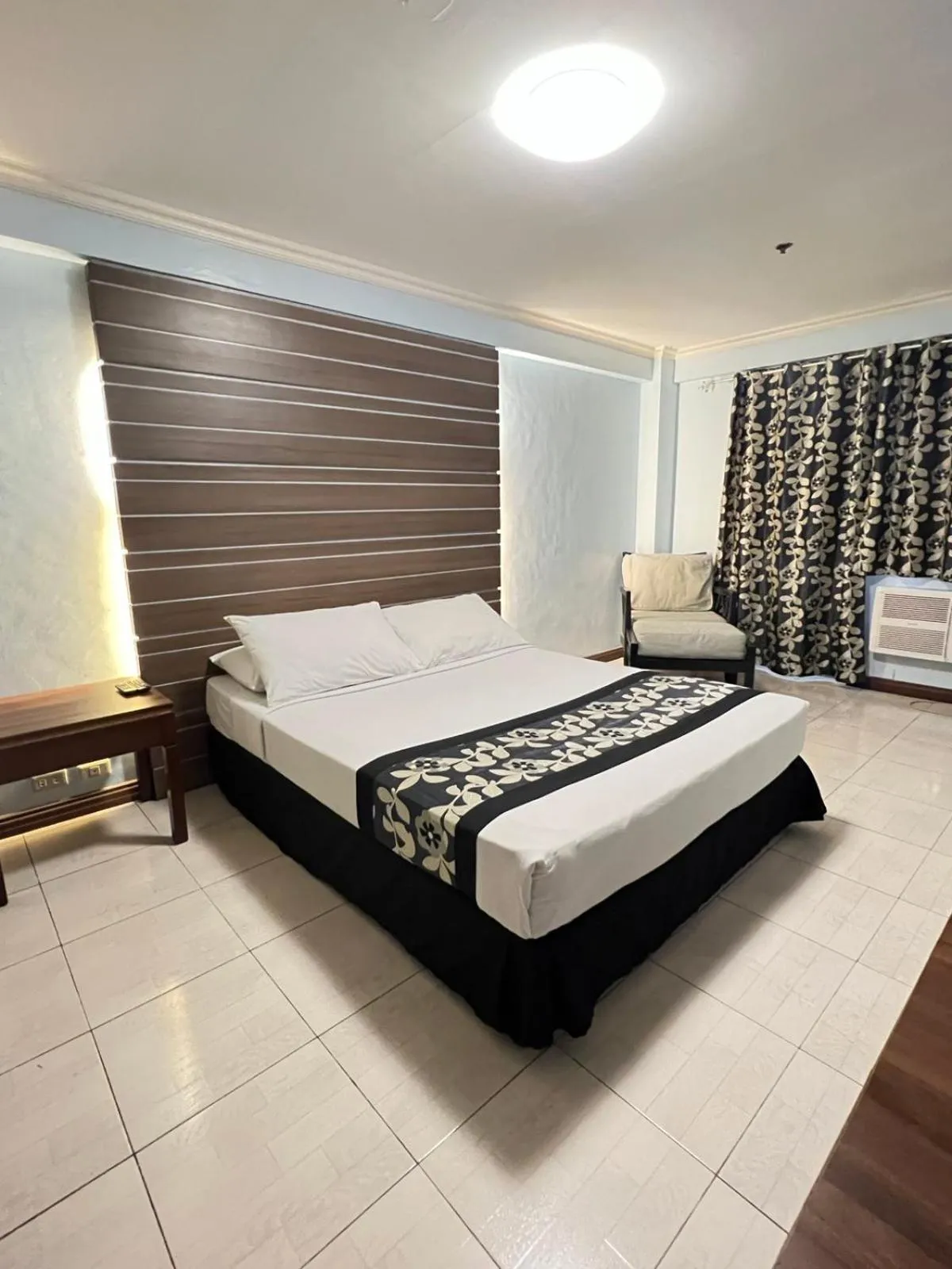 Bed in Jupiter Suites