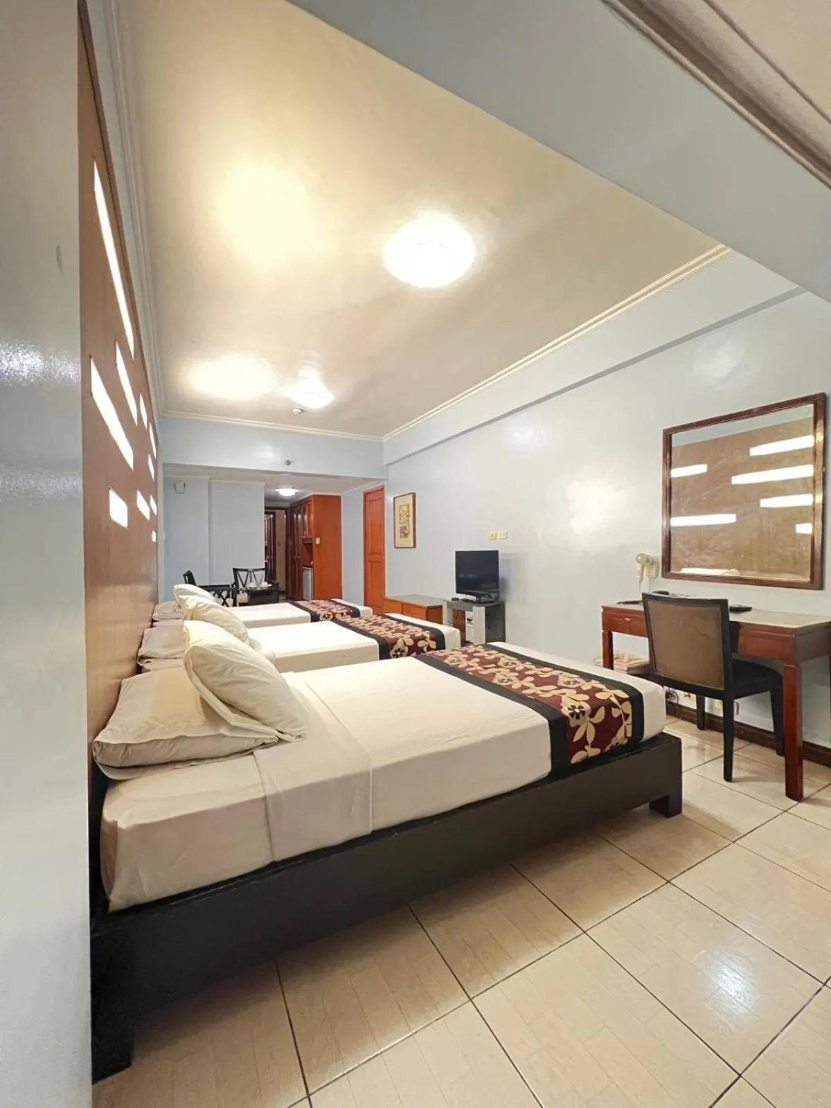 Bed in Jupiter Suites