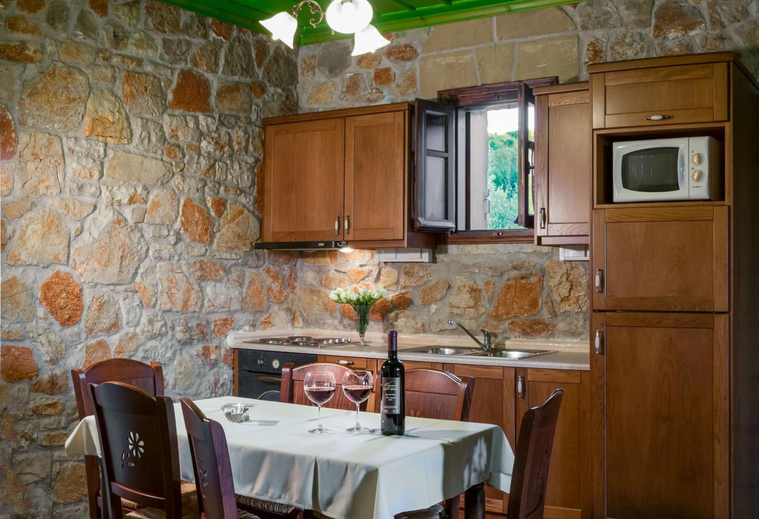 Kitchen or kitchenette in Klymeni Traditional Homes