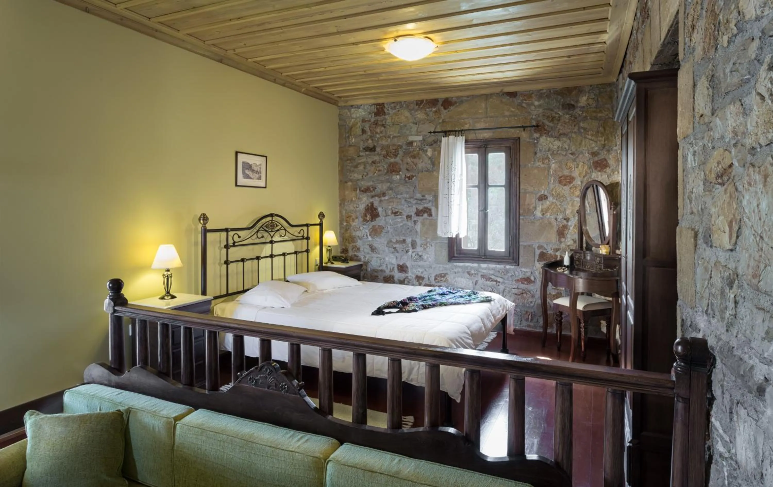 Bed in Klymeni Traditional Homes