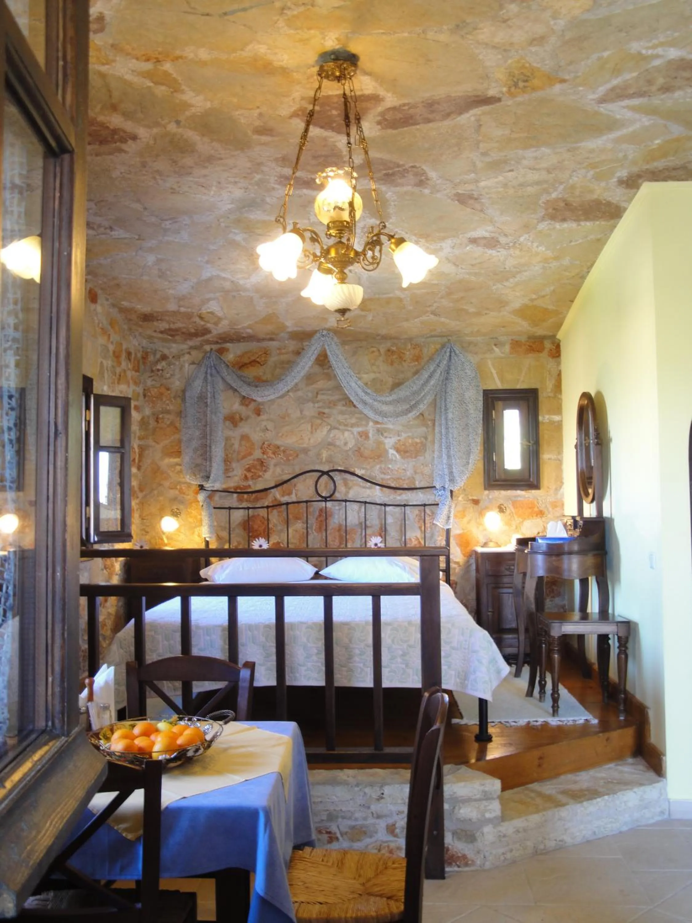 Bed in Klymeni Traditional Homes