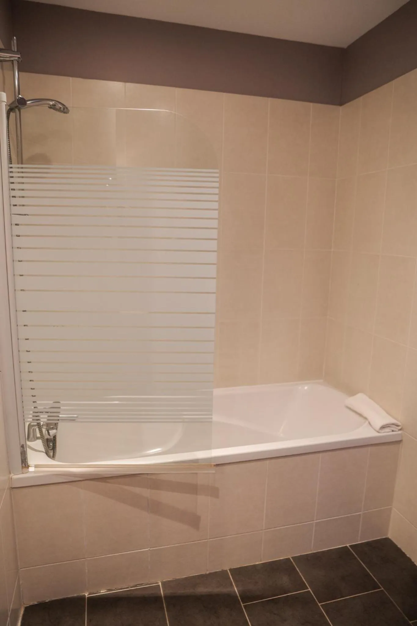 Bathroom in Logis Hotel Spa Restaurant Au Site Normand