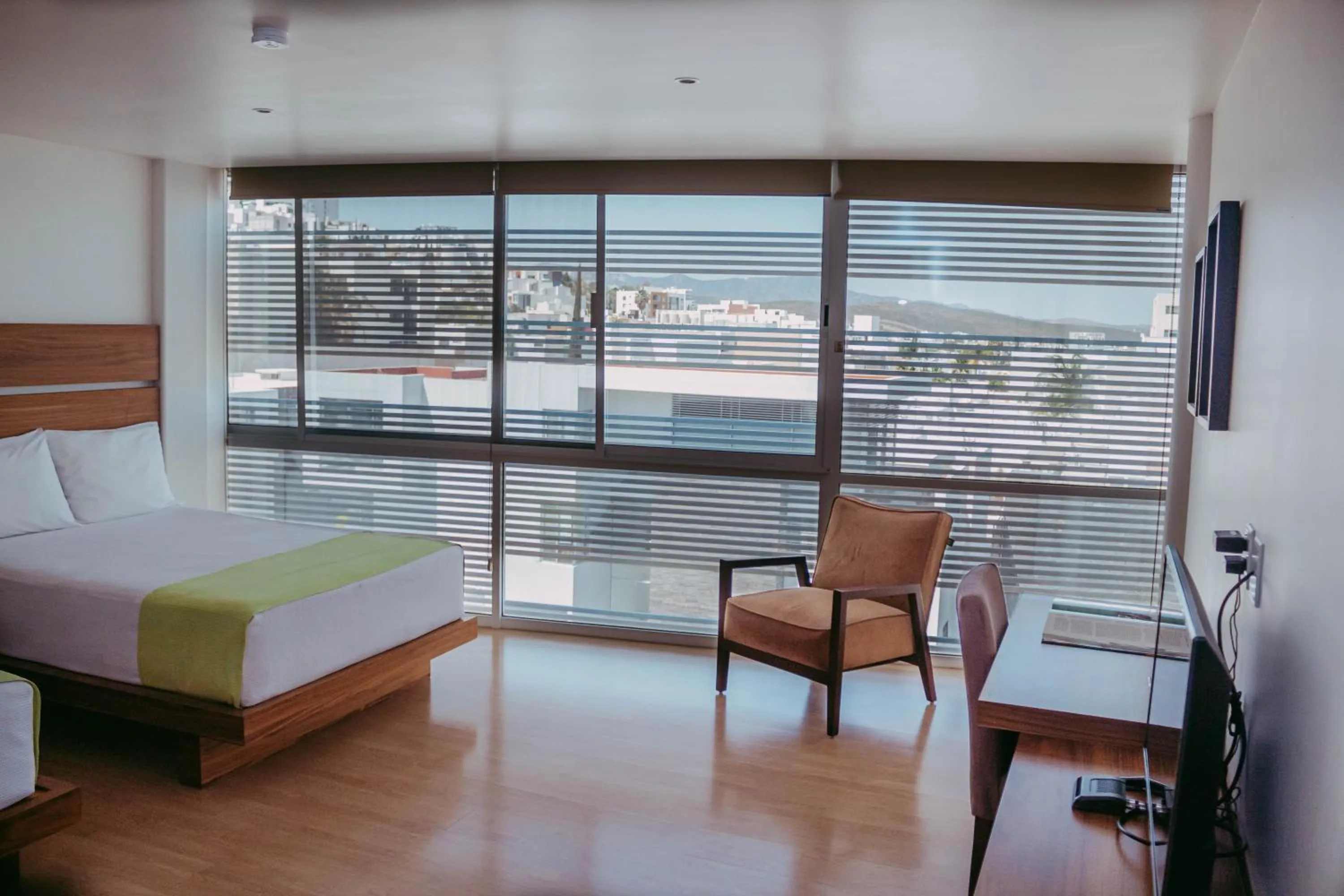 Bed in Millenium Plaza & Suites