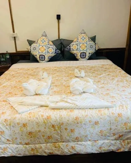 Bed in Baan Khaosok Resort