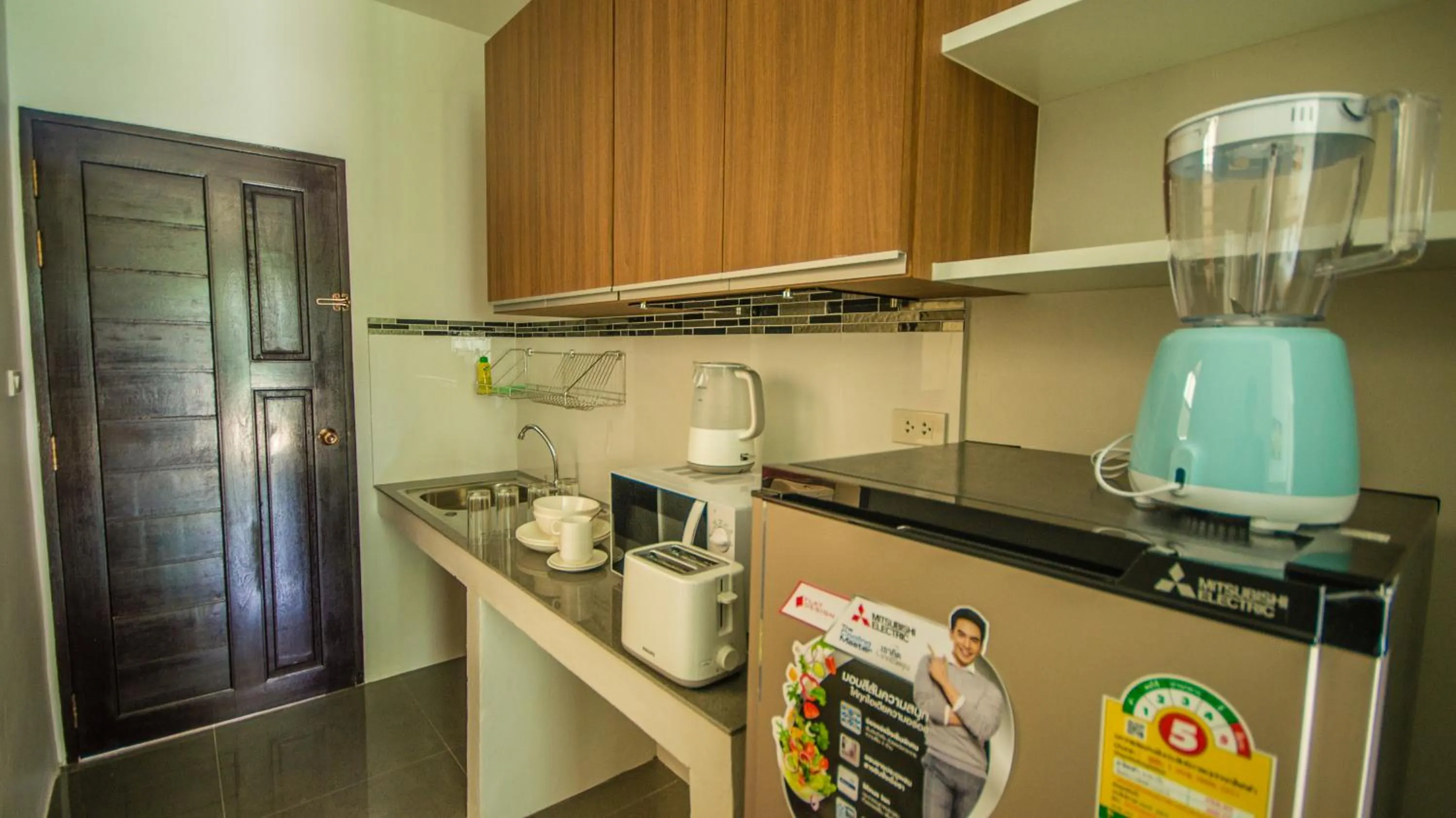 Kitchen or kitchenette in Nitchanan Villa