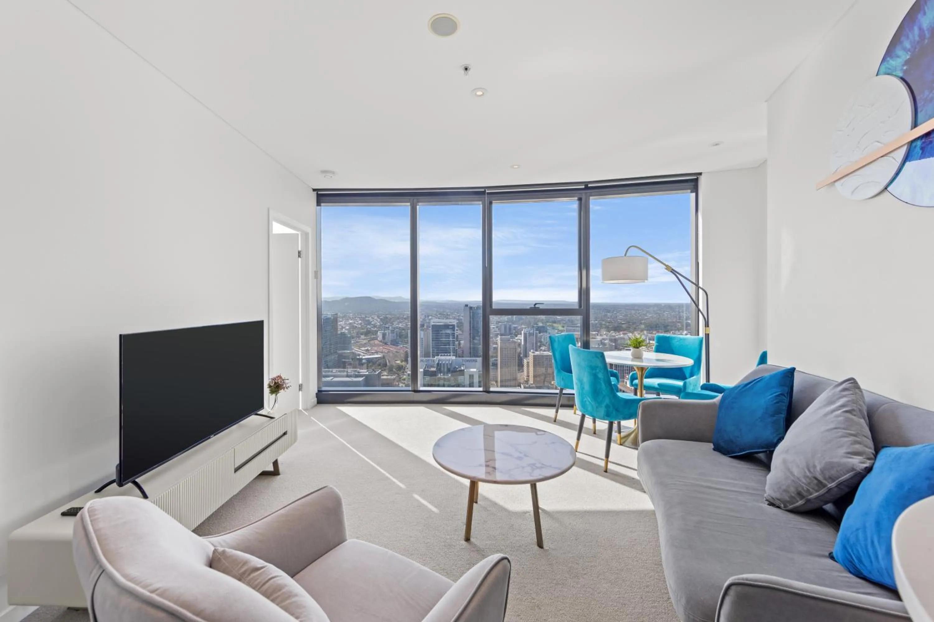 Living room in Brisbane Skytower by CLLIX