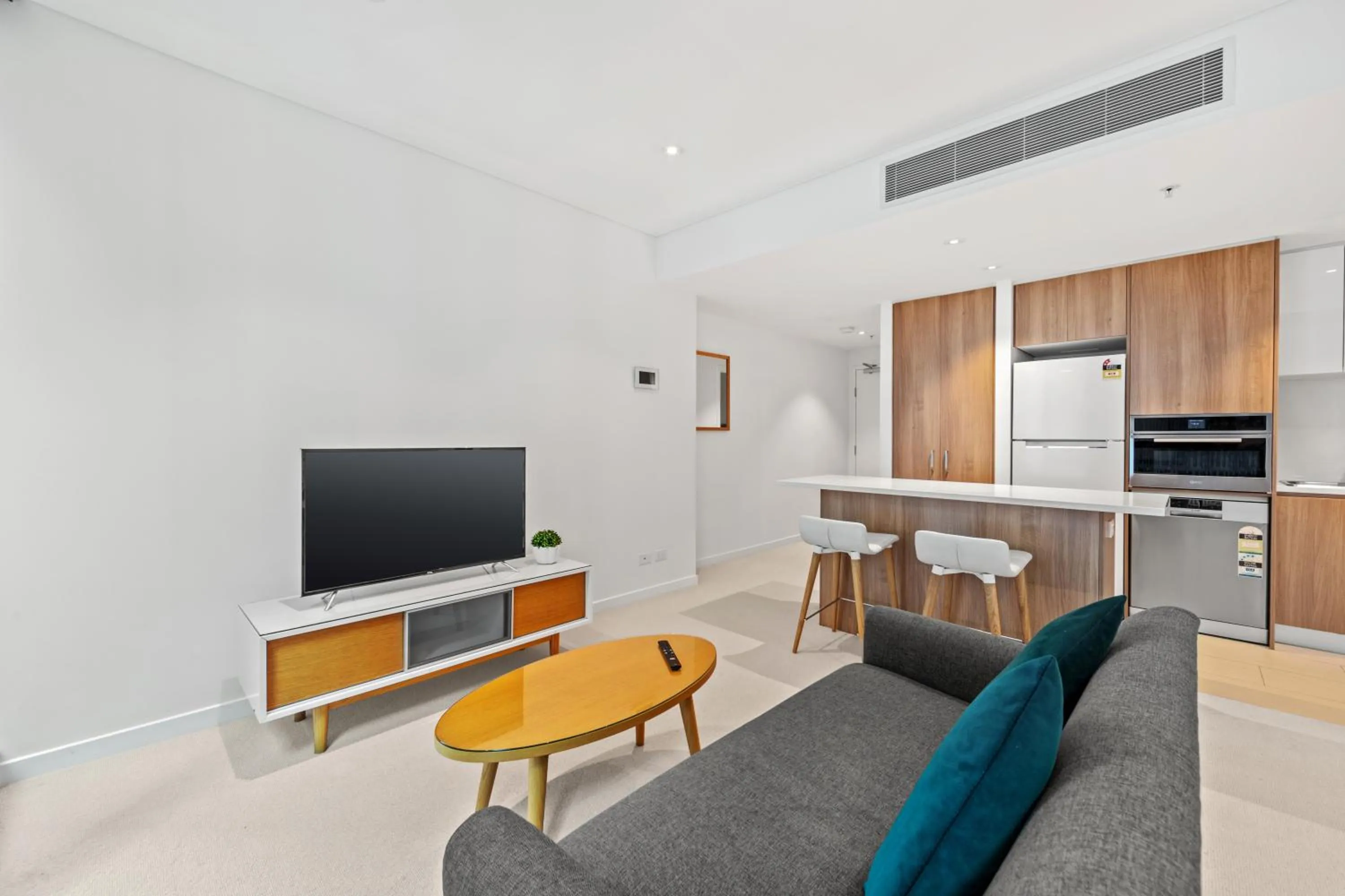 Living room in Brisbane Skytower by CLLIX