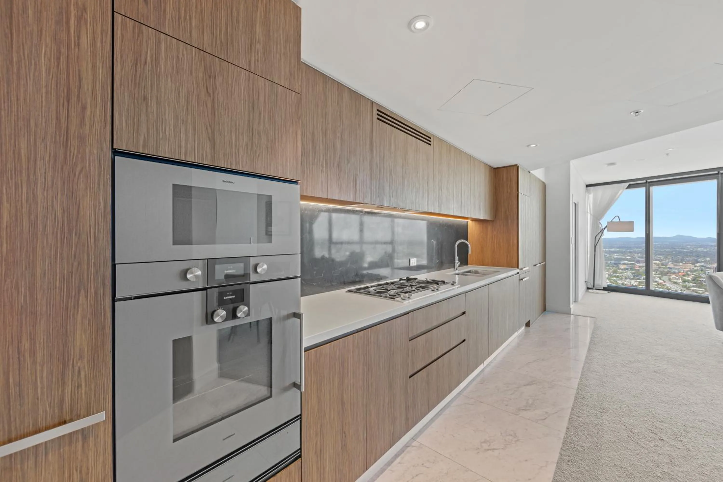 Kitchen or kitchenette in Brisbane Skytower by CLLIX