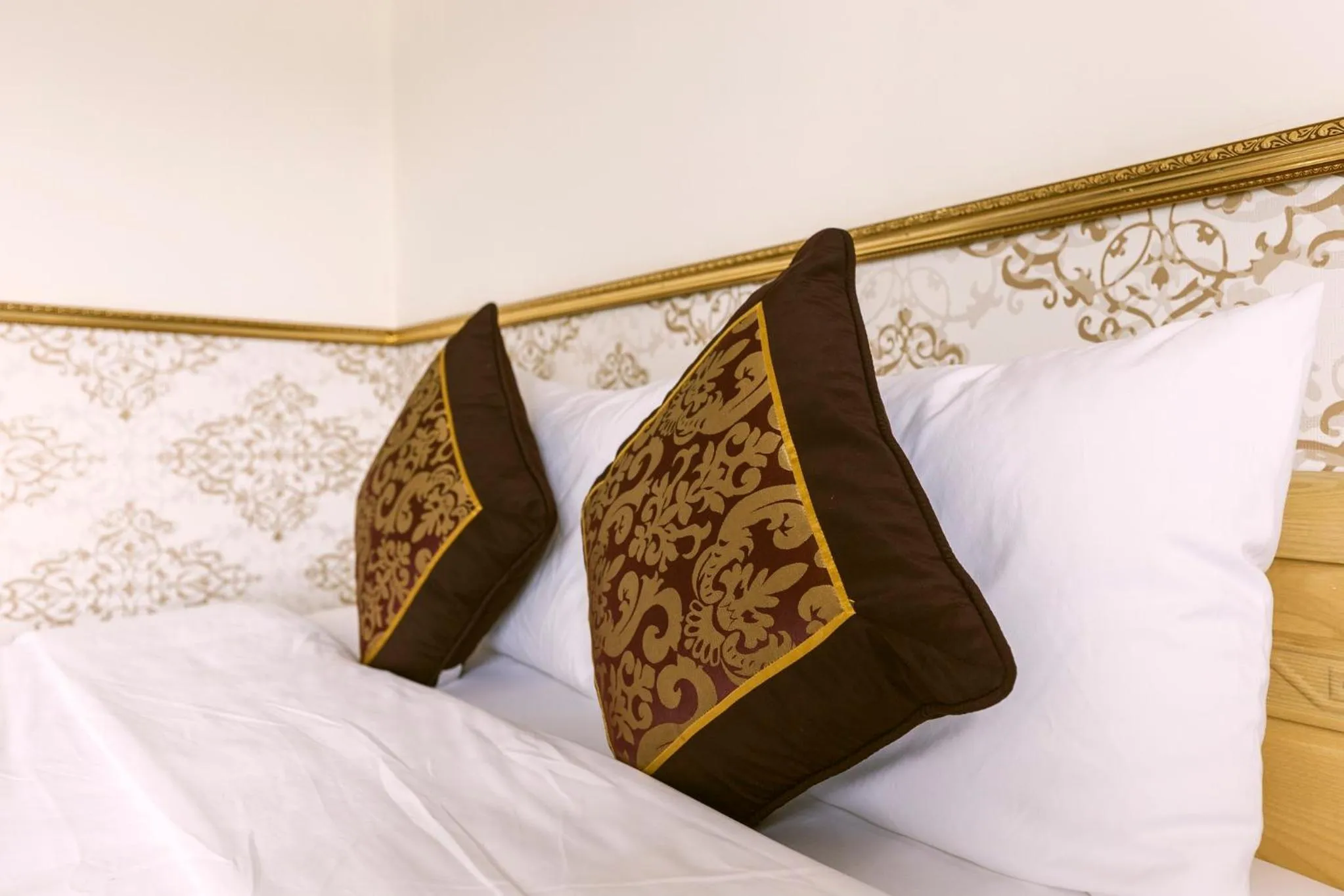 Bed in AEC Hotel Ban Me