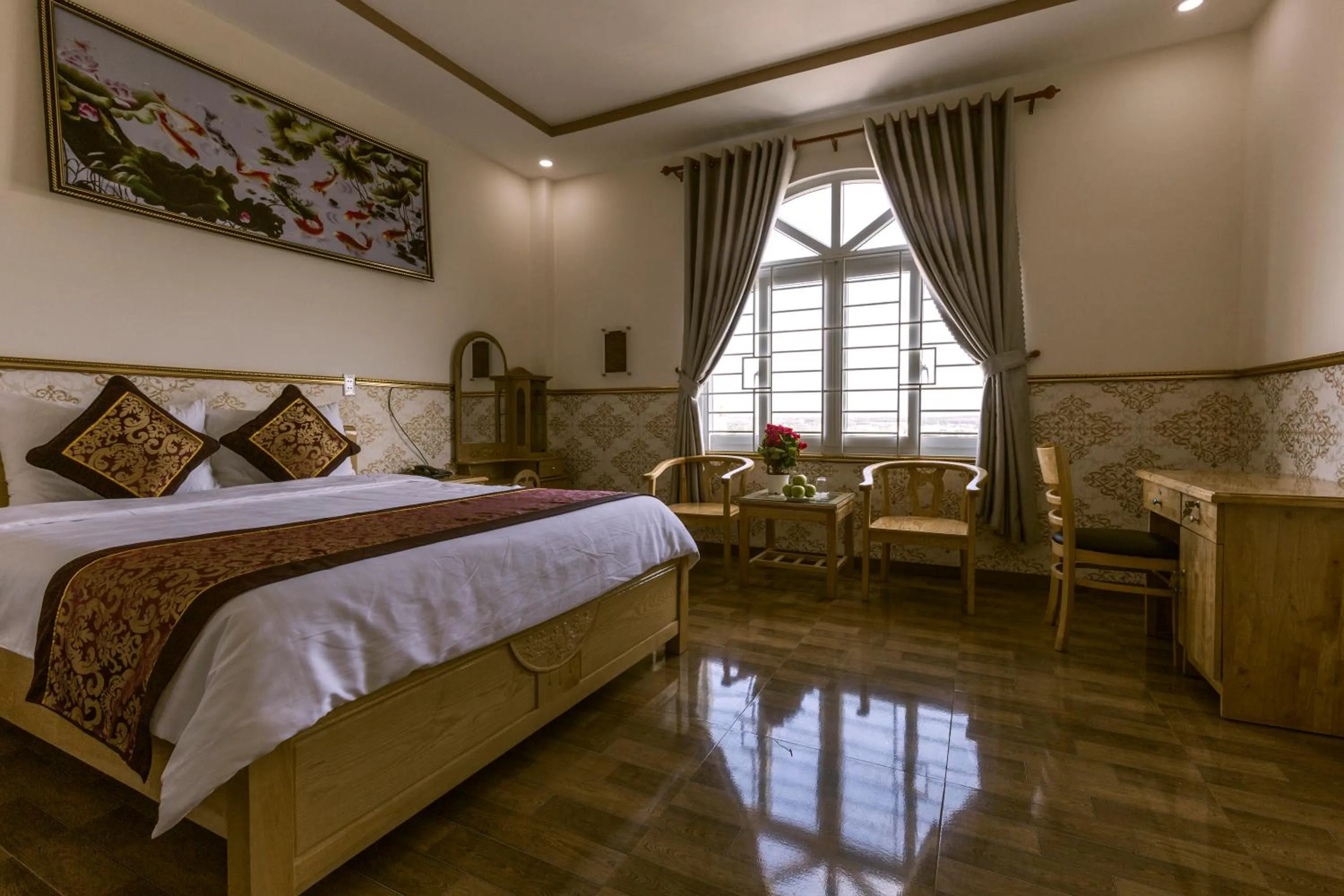 Bed in AEC Hotel Ban Me