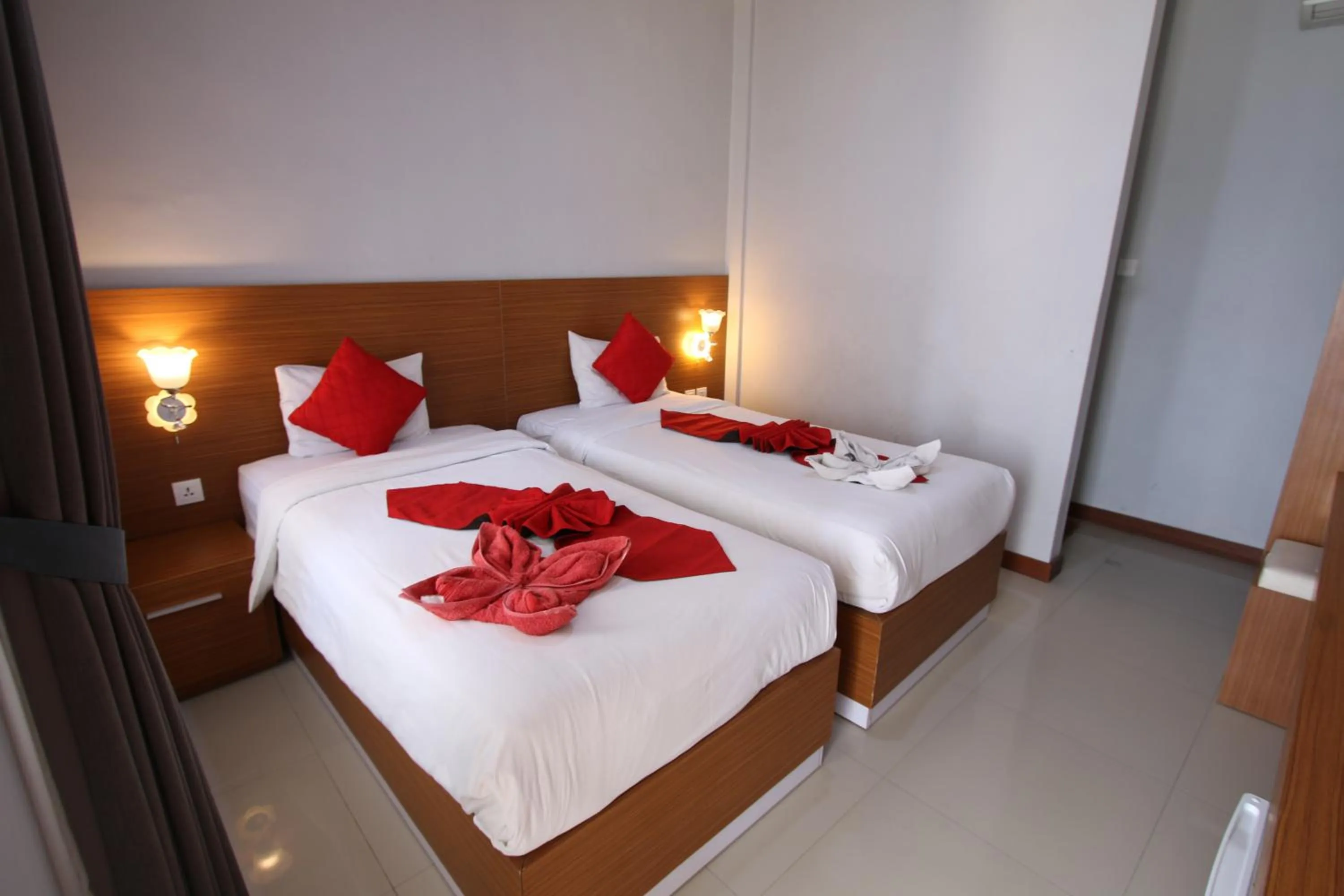 Bed in Tom Guest House