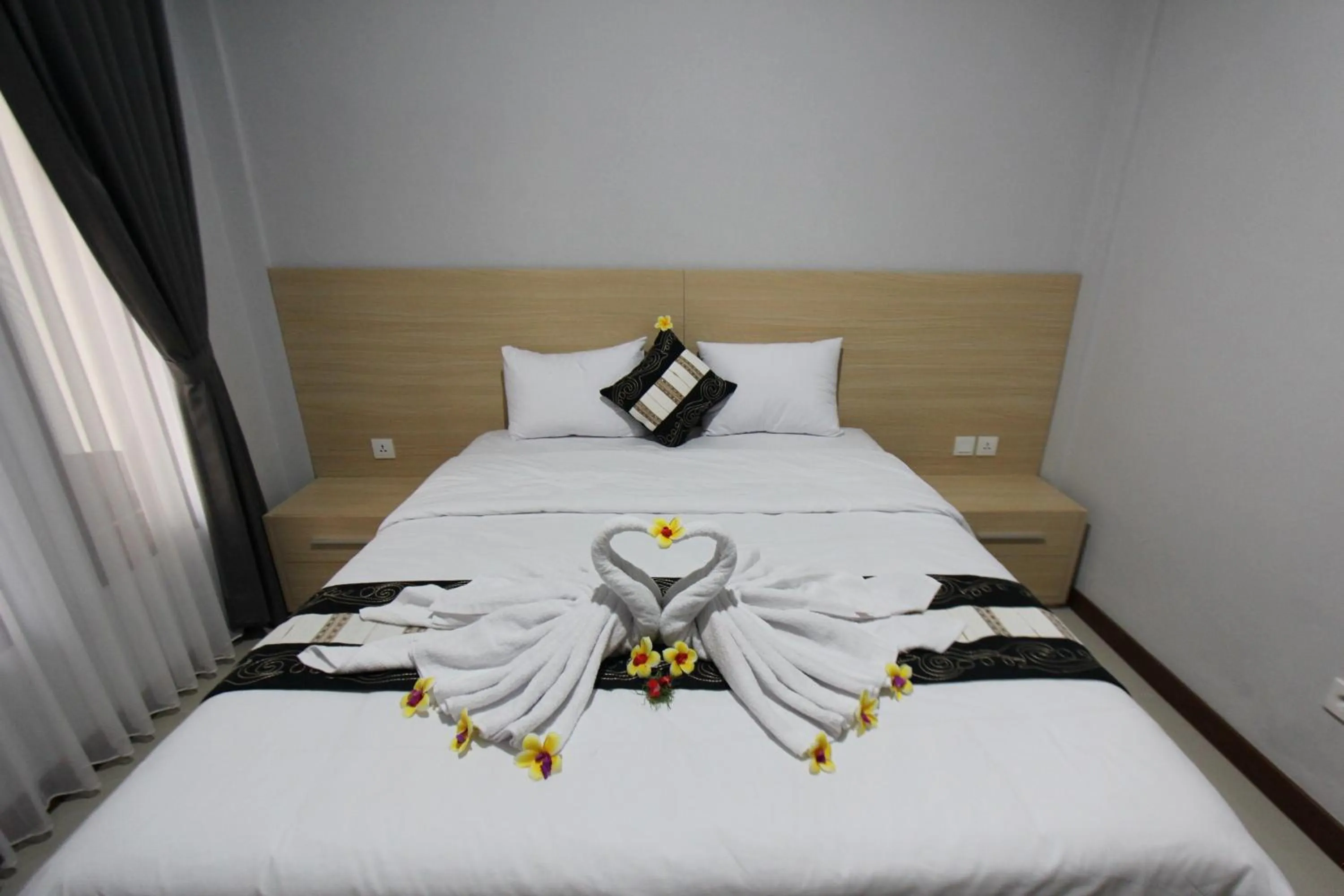 Bed in Tom Guest House