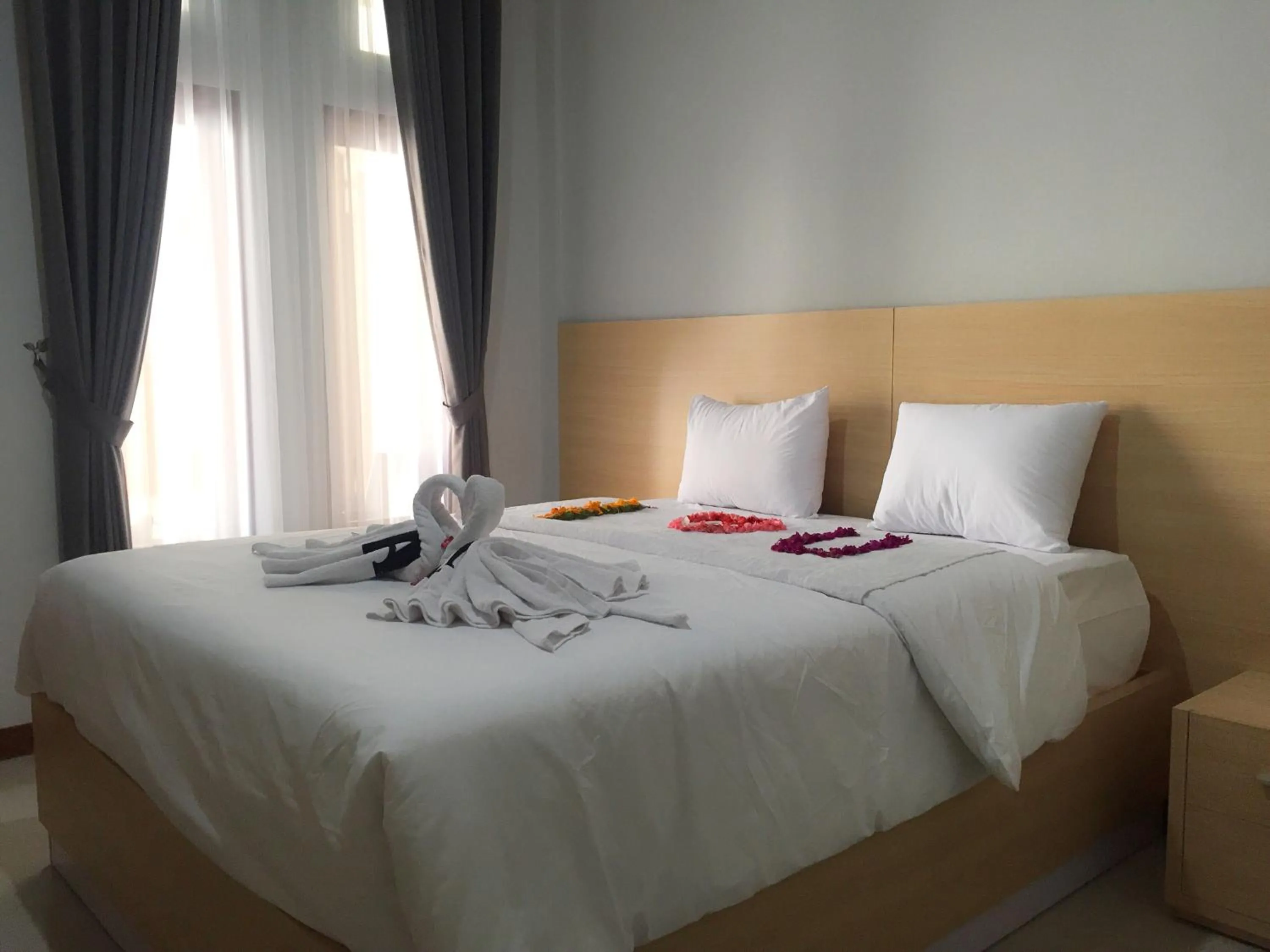 Bed in Tom Guest House