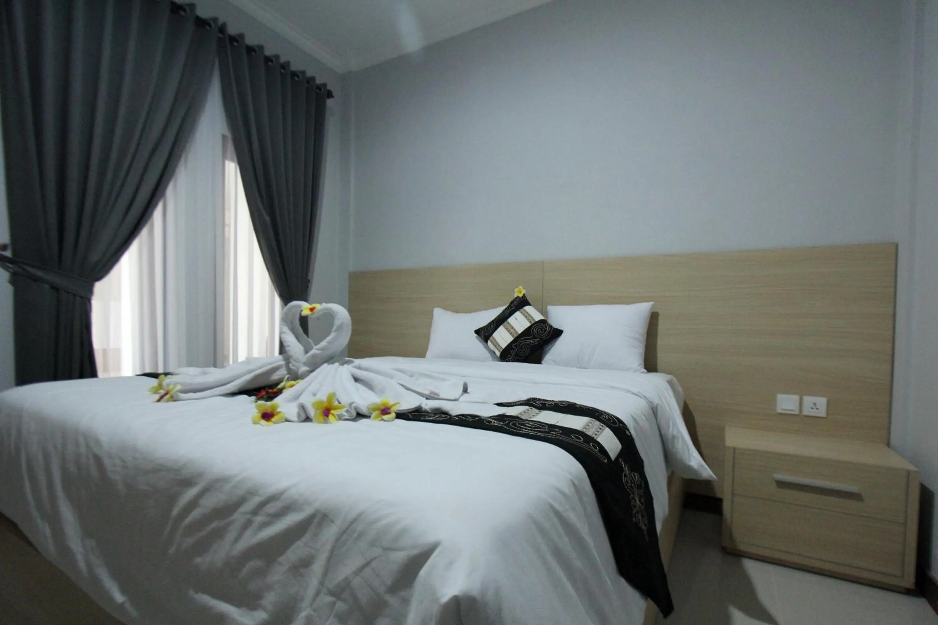 Bed in Tom Guest House