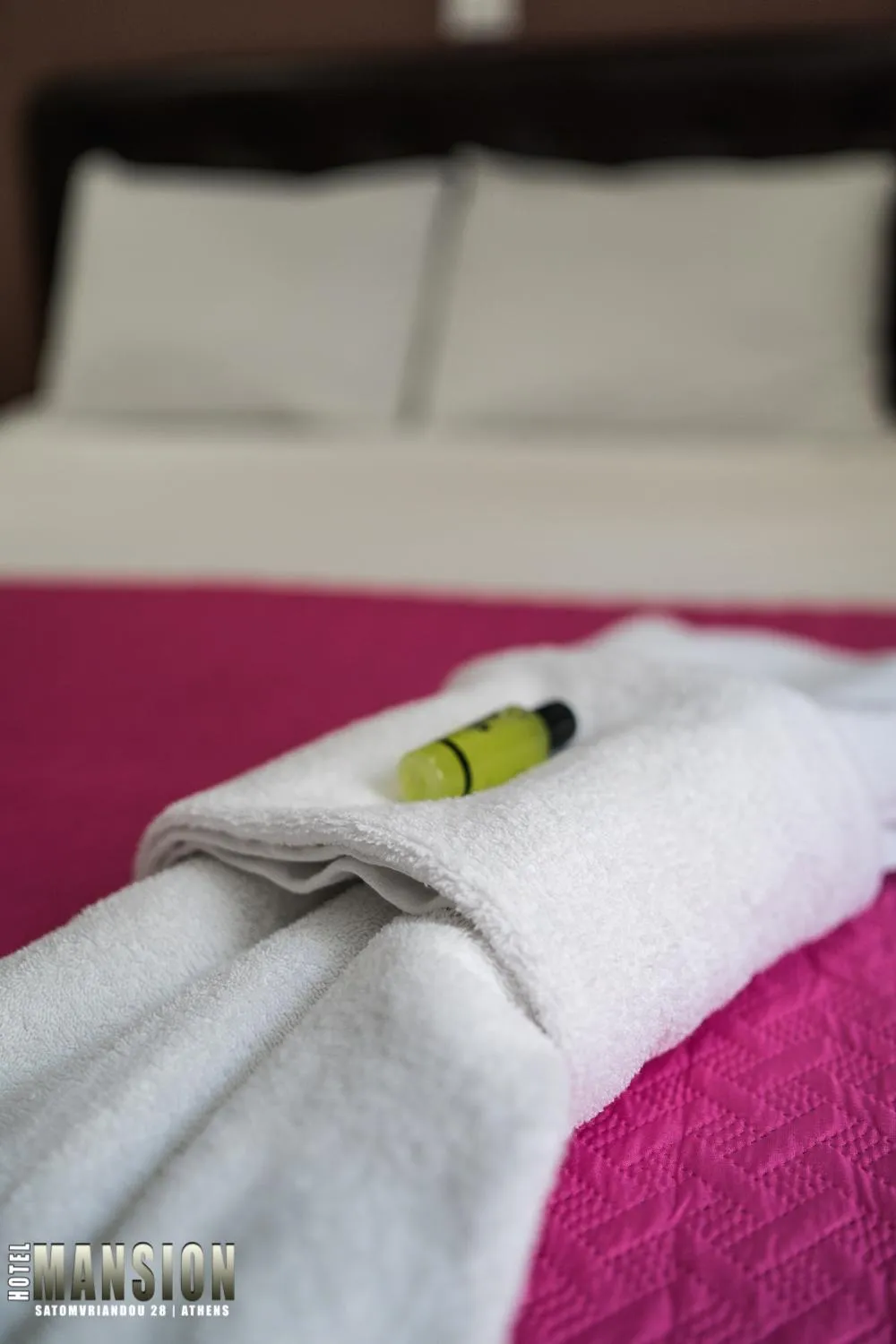 Bed in Mansion Hotel