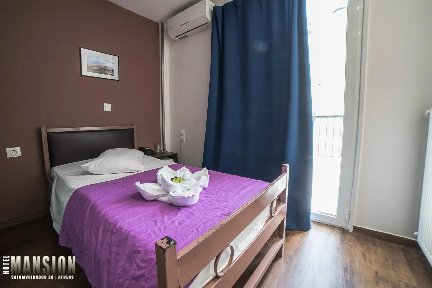 Bed in Mansion Hotel