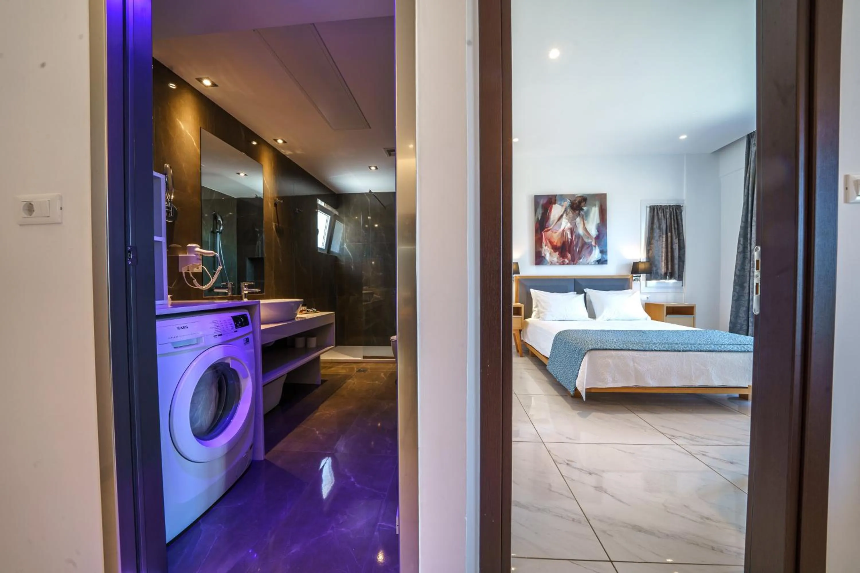 Bathroom, Bed in Elysian Suites