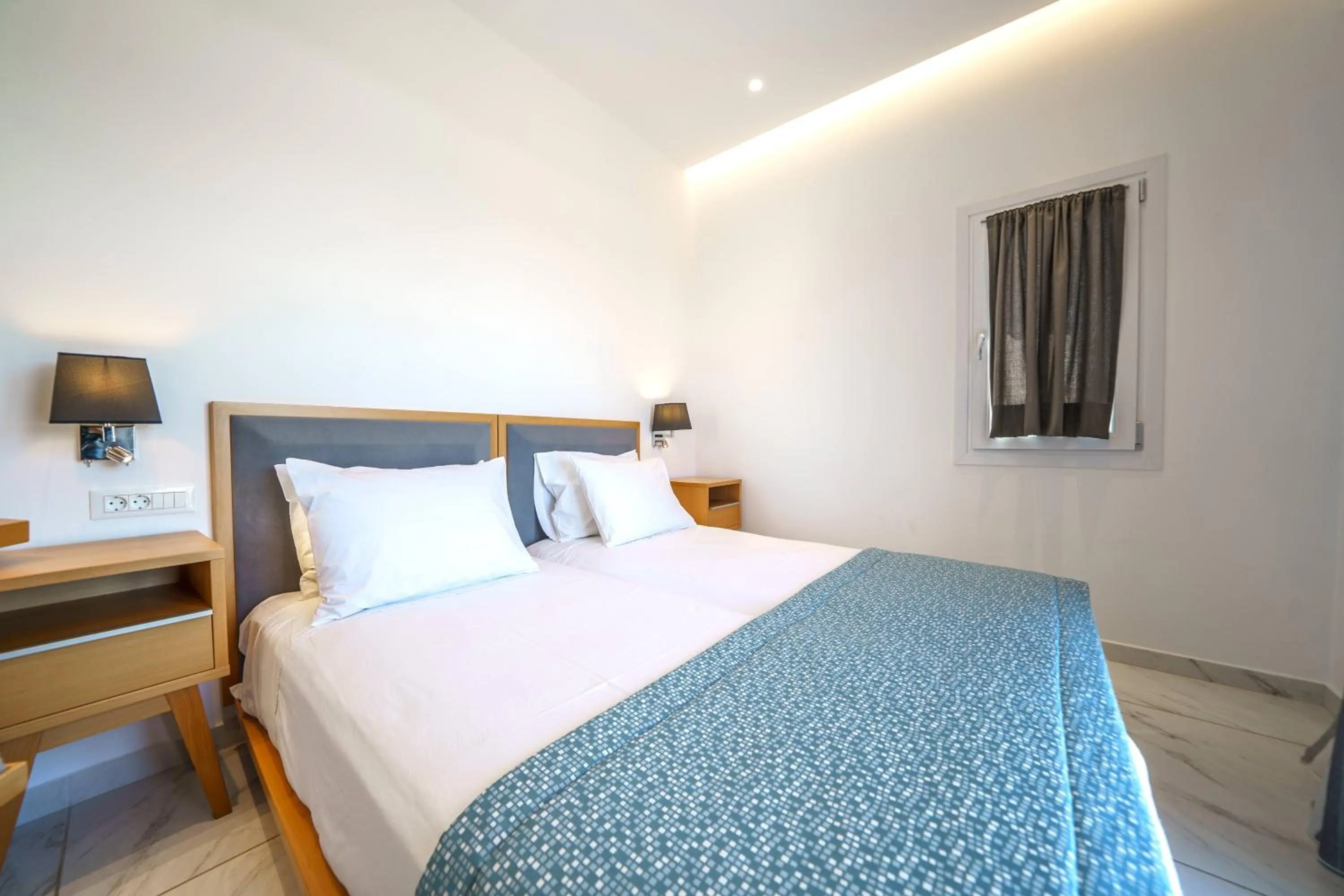 Bedroom, Bed in Elysian Suites