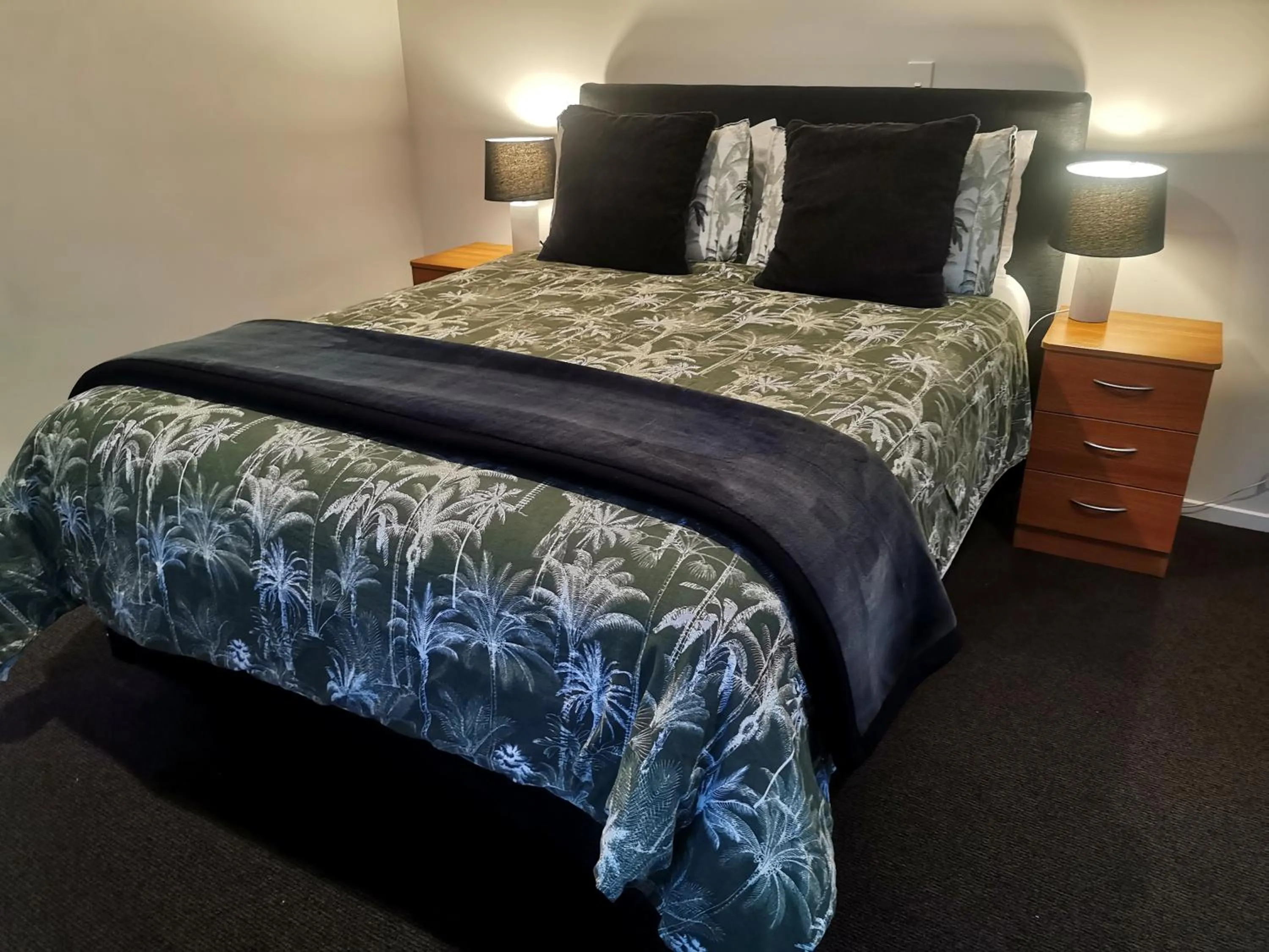 Bed in ASURE Ascot Motor Inn