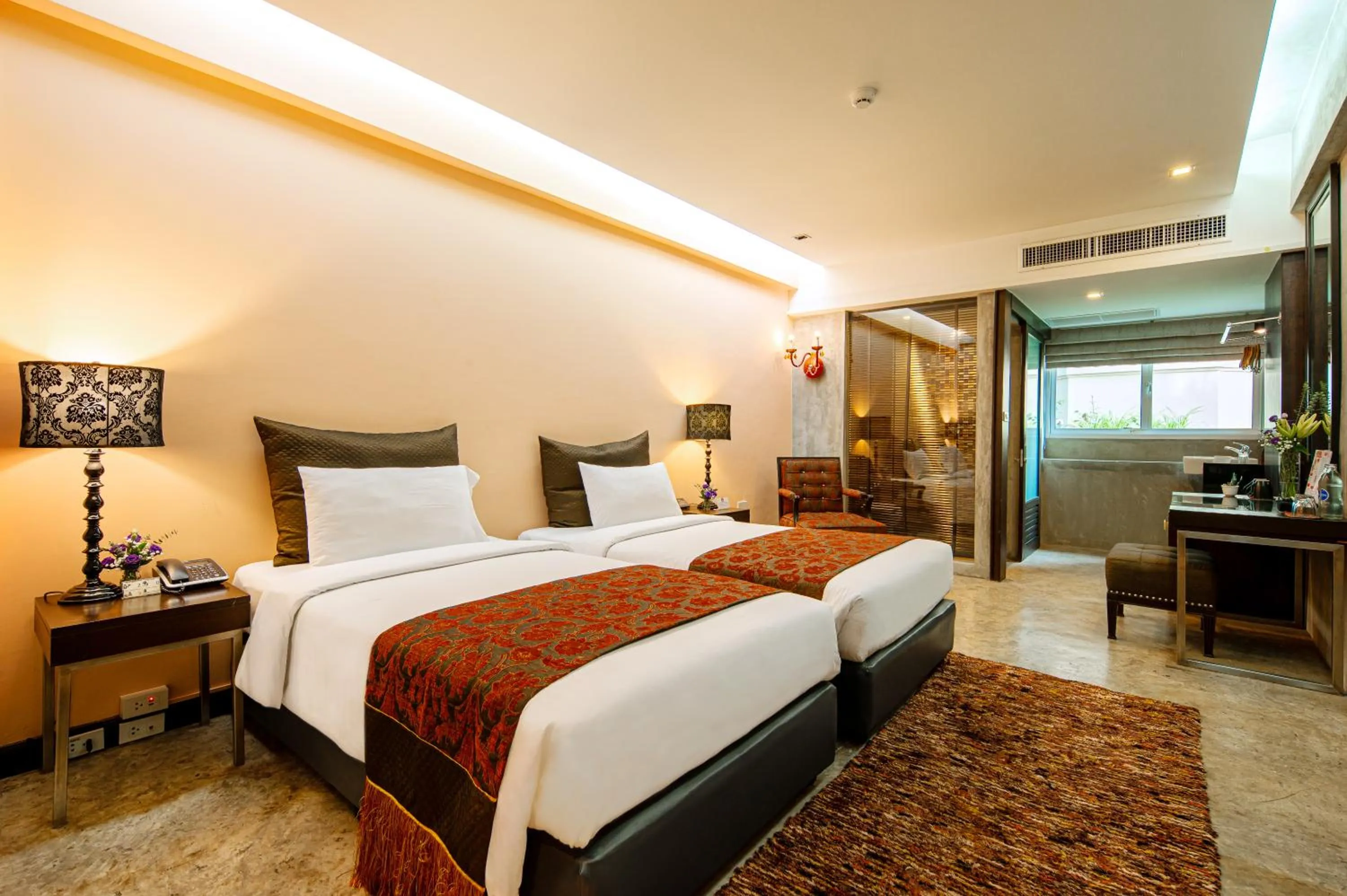 Bed in Sunbeam Hotel Pattaya