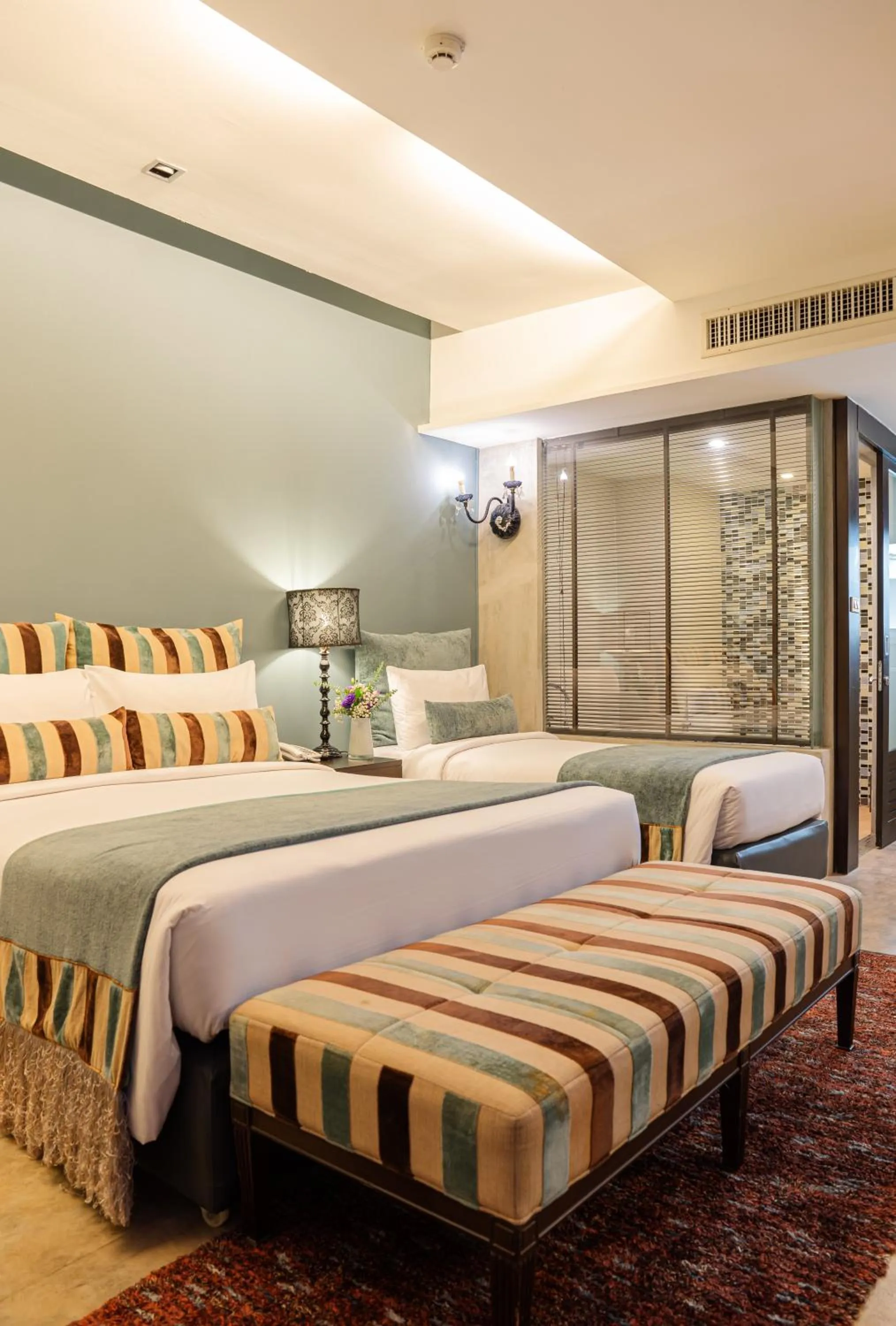 Bed in Sunbeam Hotel Pattaya