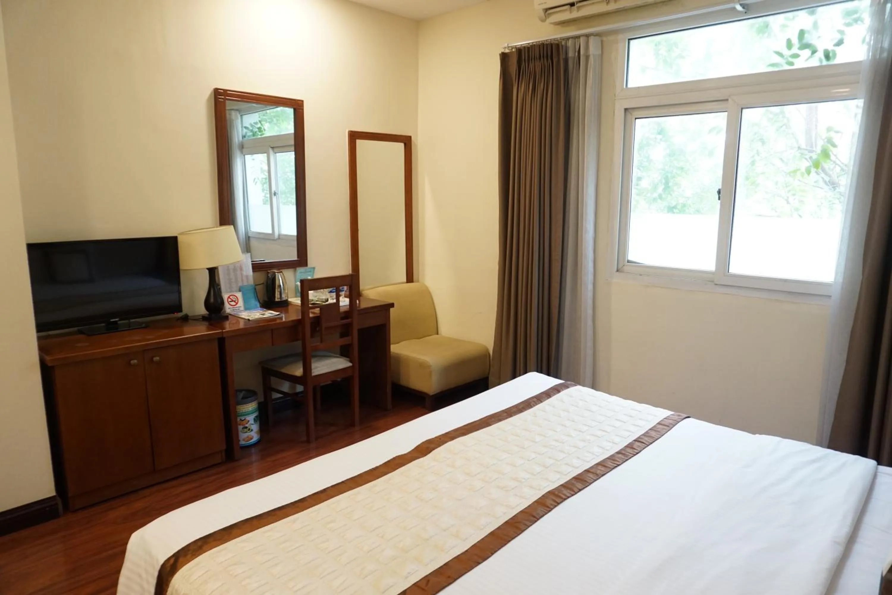 Bed in Dong Khanh Hotel