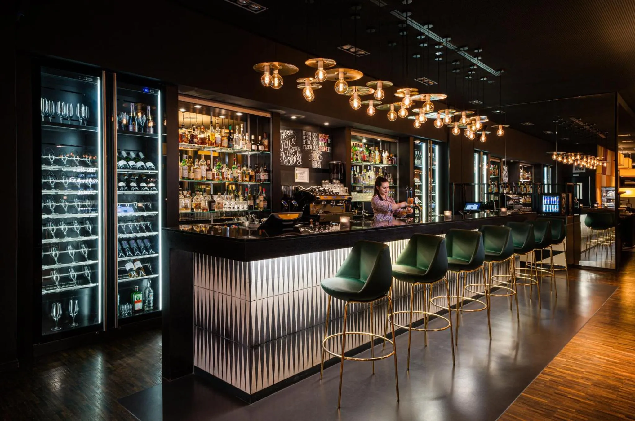 Lounge or bar in Holiday Inn Zürich Messe by IHG