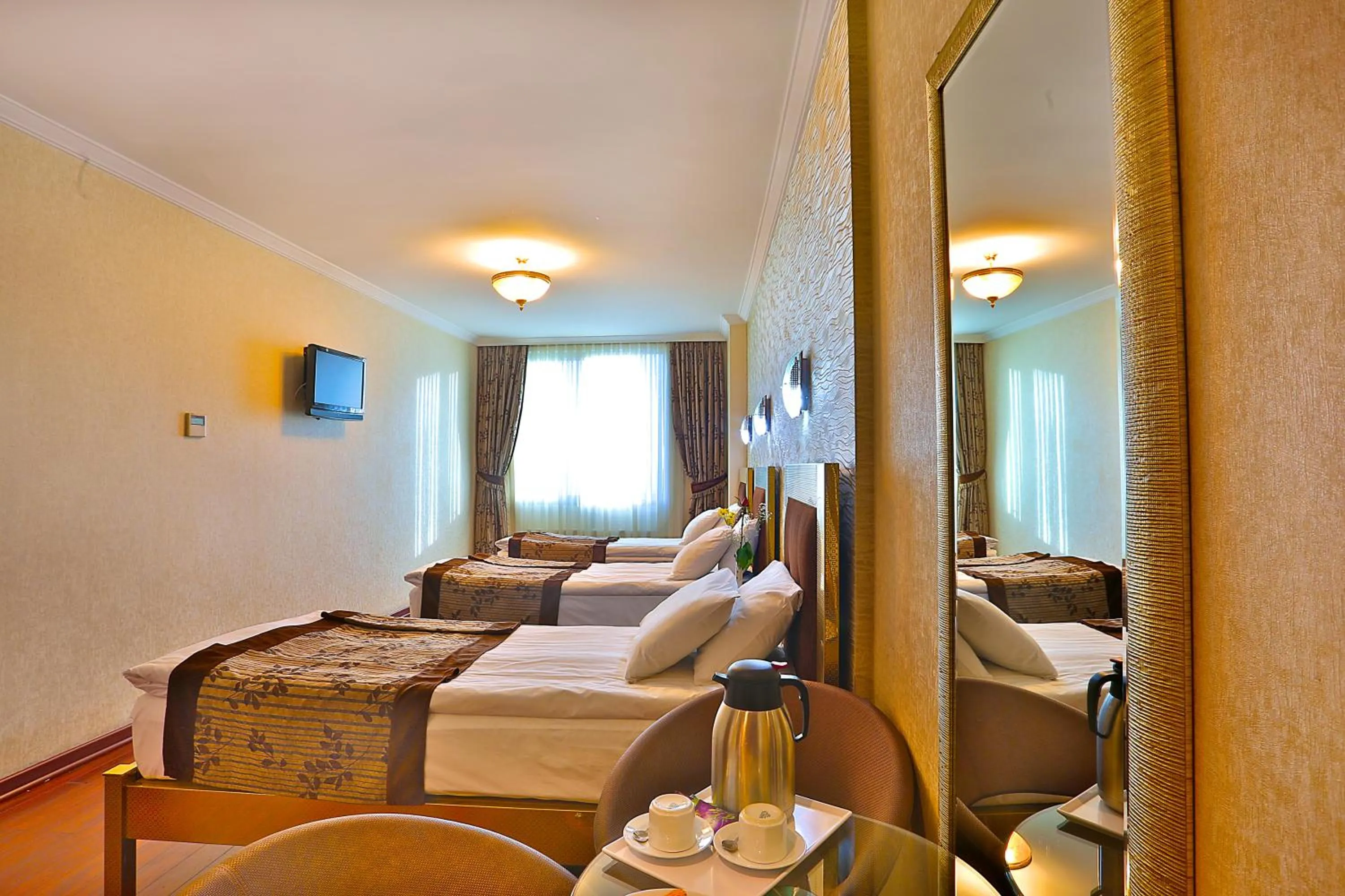 Standard Triple Room in Grand Madrid Hotel