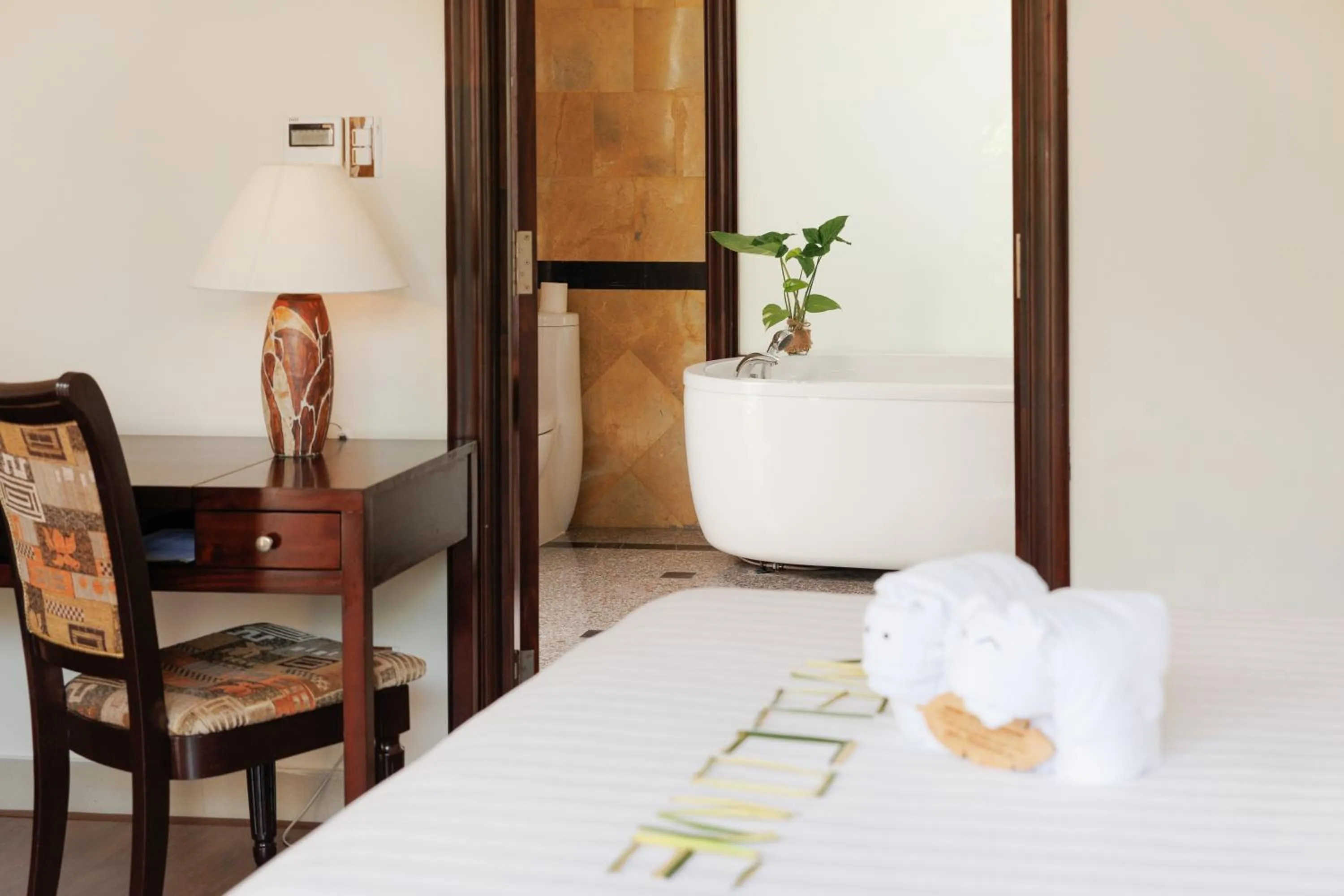 View (from property/room), Bed in Diamond Bay Resort & Spa