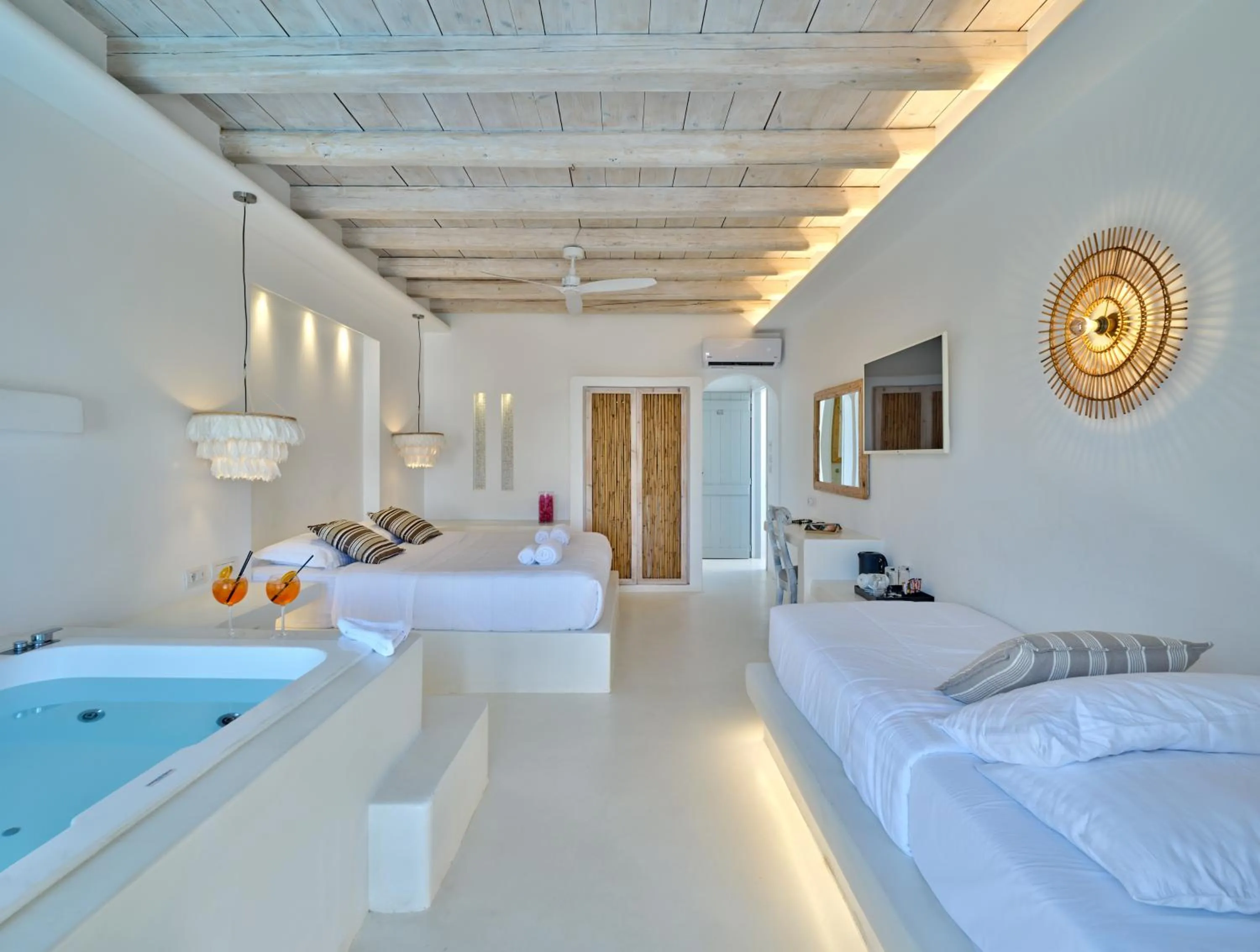 Bed in Zefi Hotel & Suites