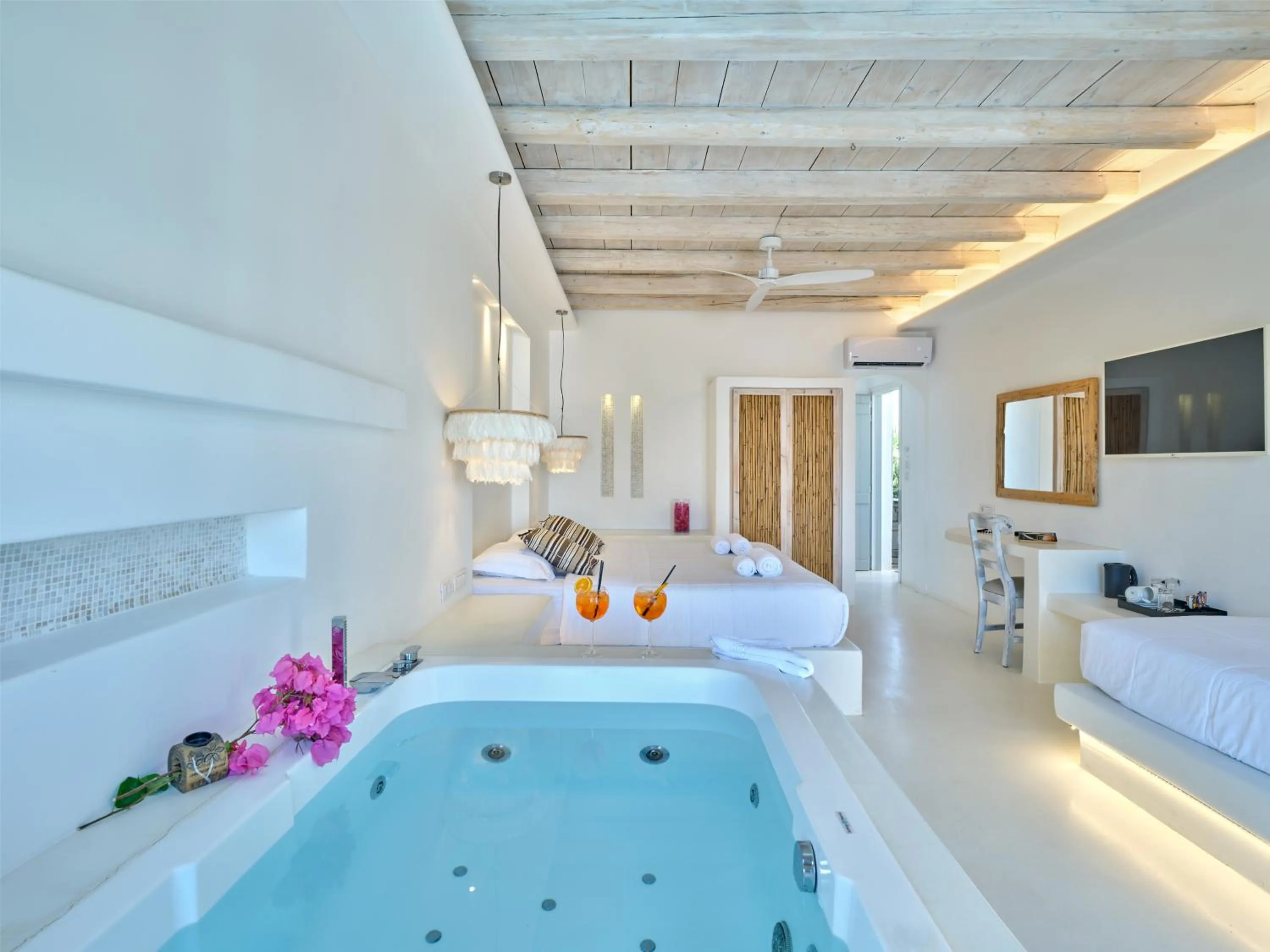 Bed in Zefi Hotel & Suites